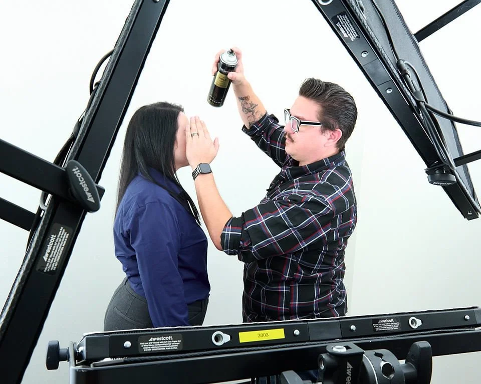 Mondo Rojas preparing client for headshot session at Pandorica Headshot Studio Las Vegas