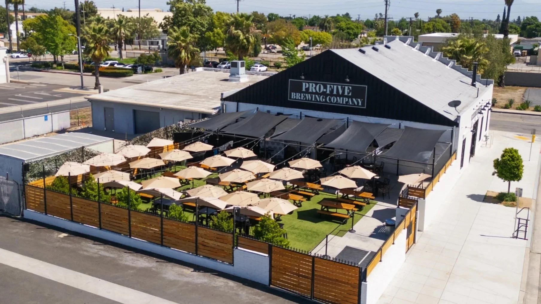 Aerial view of Pro-Five Brewing Company with outdoor patio seating area featuring space for live music, events and celebrations