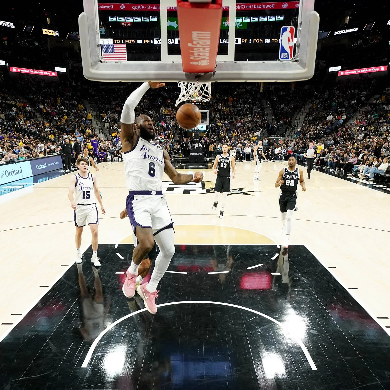 LeBron lifts Lakers past Spurs in shootout.