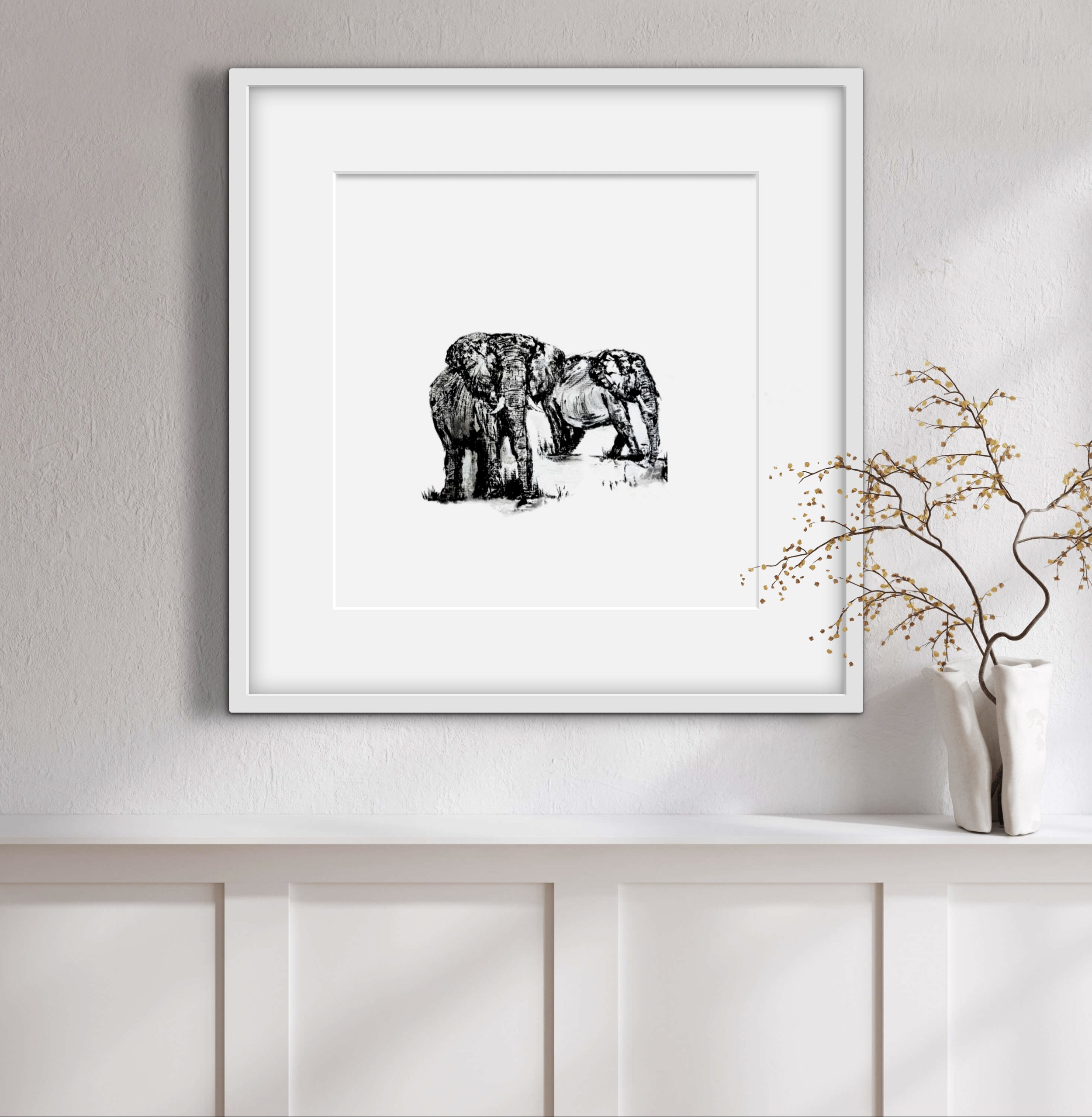 Black and white sketch of two elephants on a white wall in a frame limited edition print at fiona j rose art cottage style gallery in angmering village