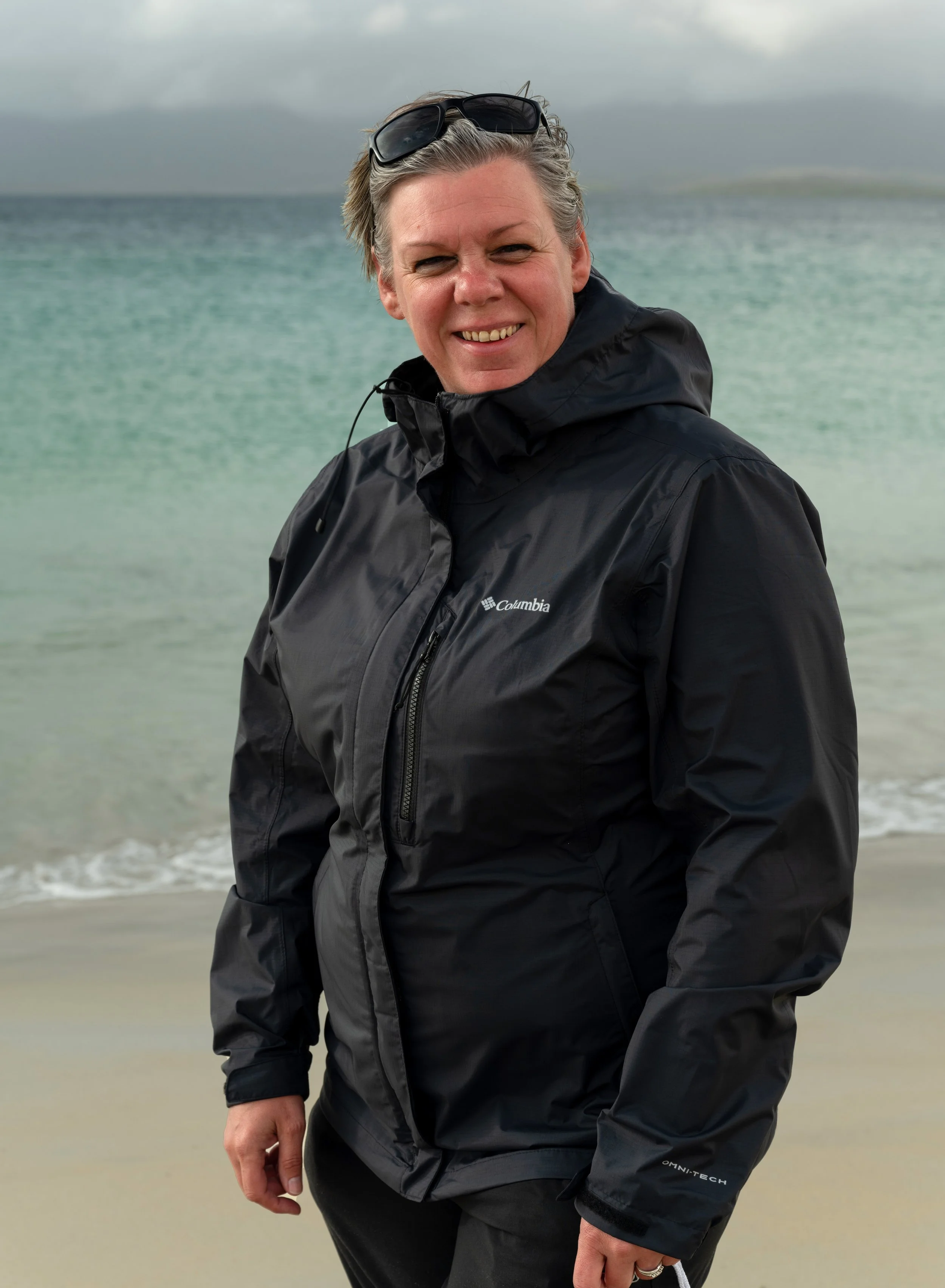 Adele Warner-Tate Outer Hebrides Photographer on the Isle of Harris coastline during golden light, capturing seascapes and dramatic Atlantic conditions