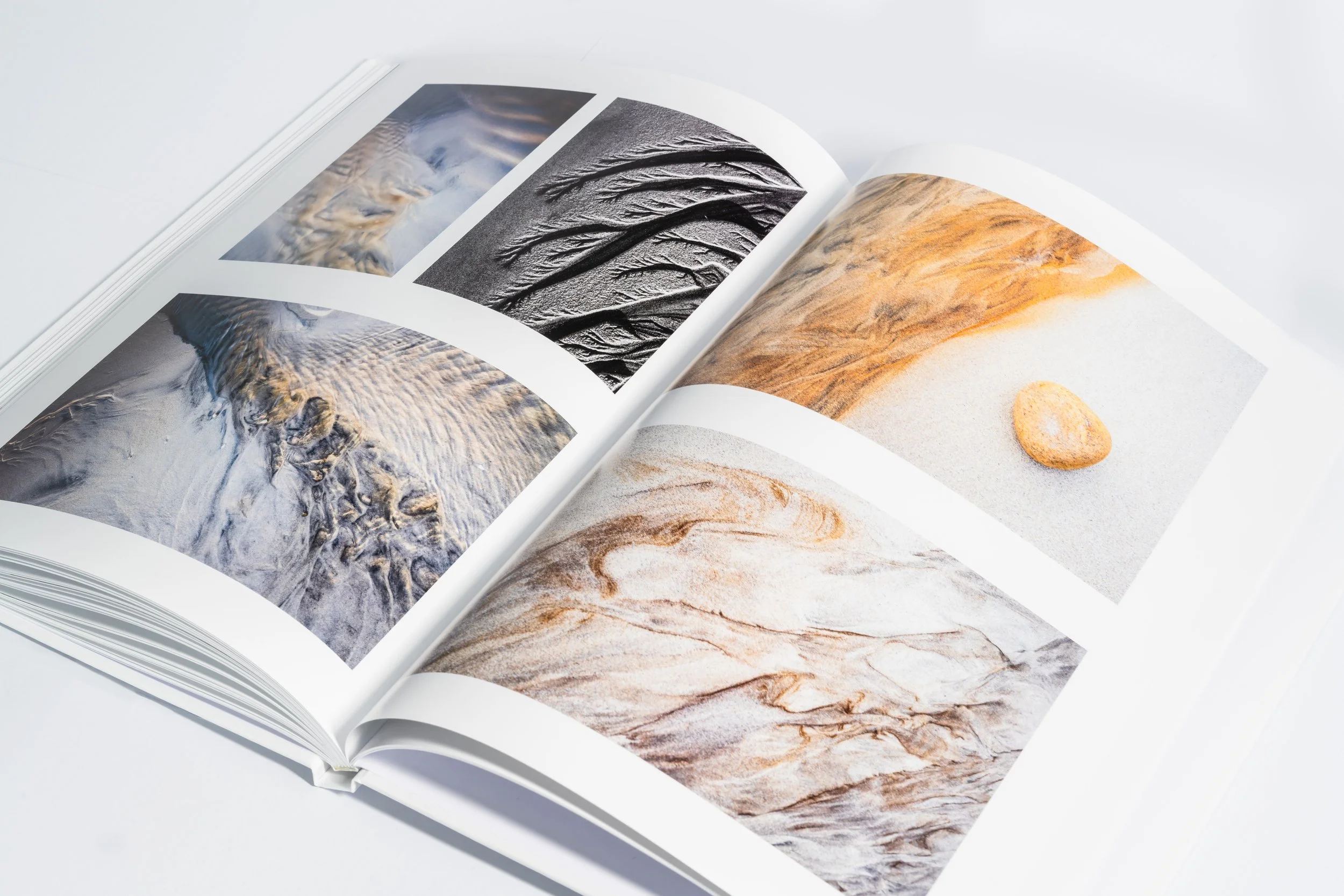 Inner page highlighting Outer Hebrides shoreline and Atlantic light in the Harris & Lewis book.