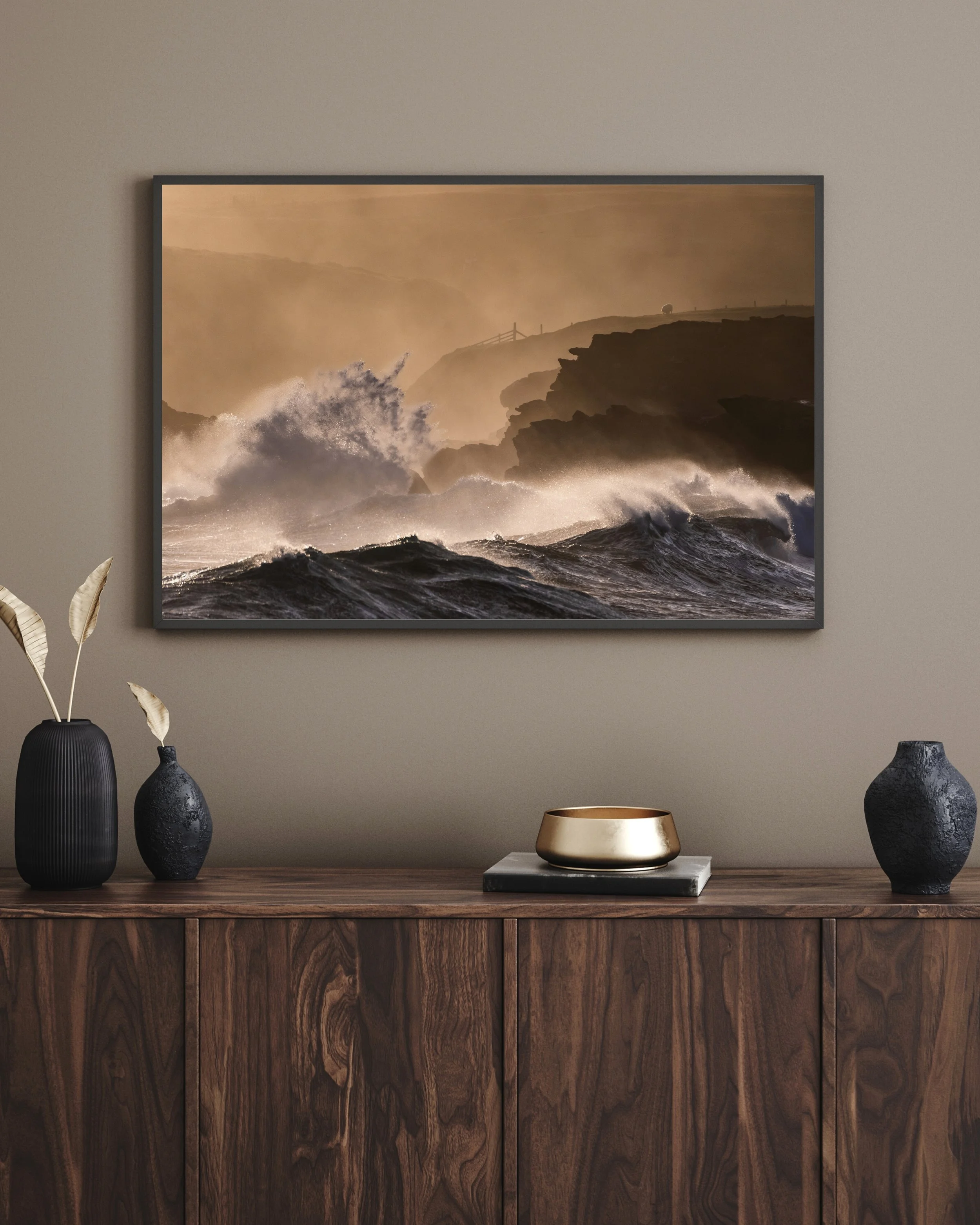 Port of Ness at sunrise on the Isle of Lewis, with towering Atlantic waves crashing into the rocks under warm morning colour.