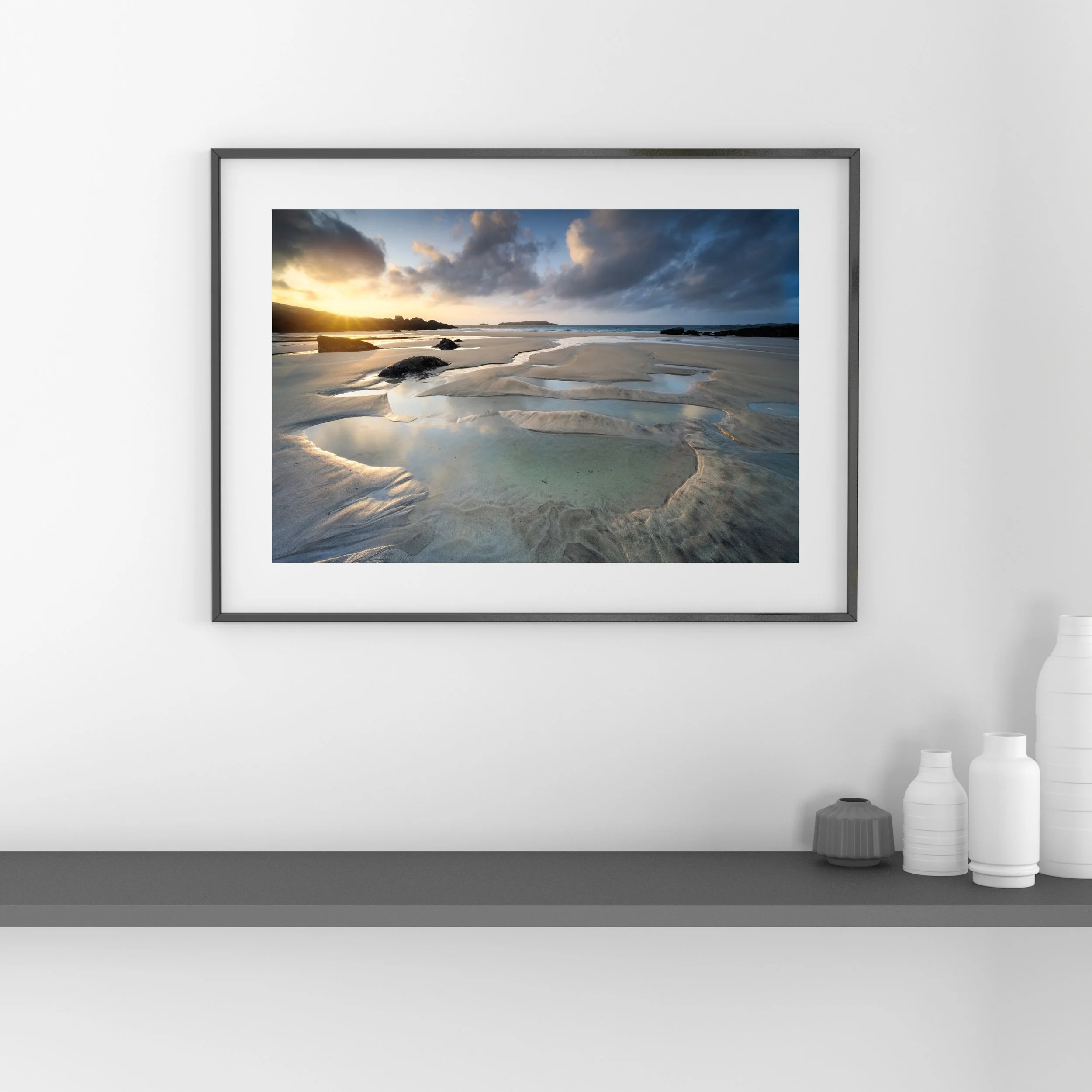 Framed Fine‑art print showing evening light across the sand and rock pools at Mealasta Beach in Uig on the Isle of Lewis.