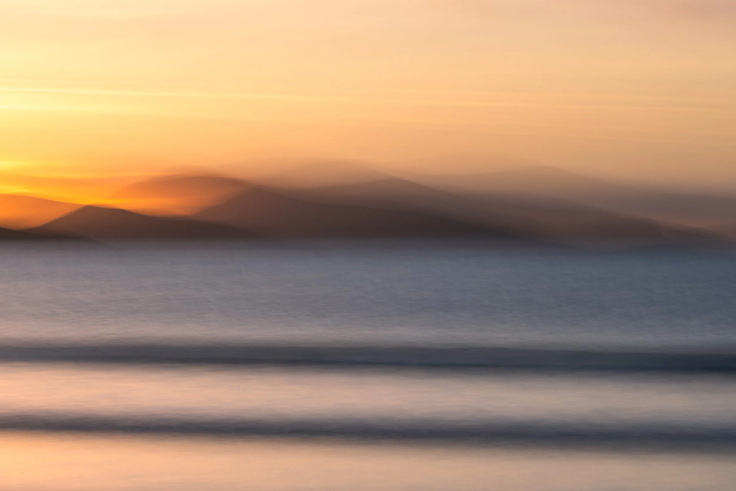 Luskentyre beach ICM photography, golden light and the blues of the atlantic ocean merge together to create soft lines
