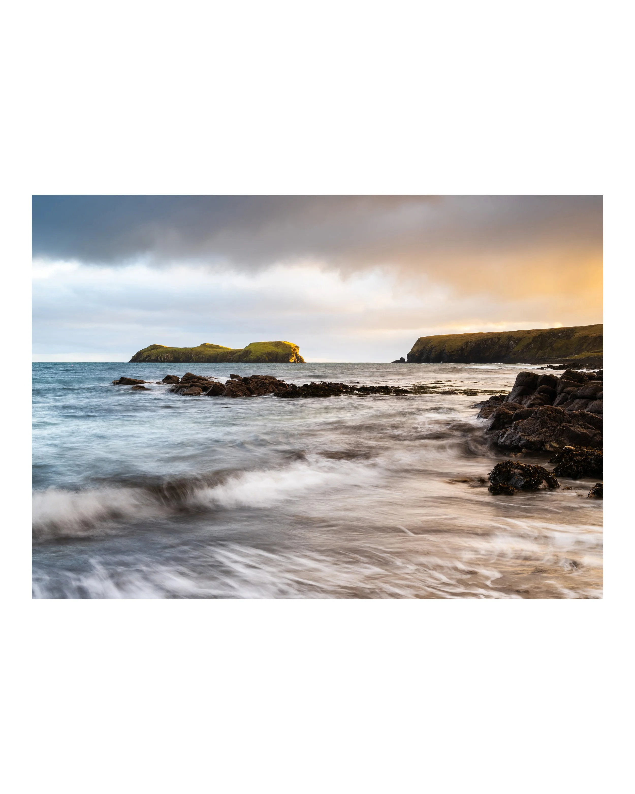 Fine‑art photograph capturing breaking waves and gentle light along the shoreline at Bayble Beach, Isle of Lewis.