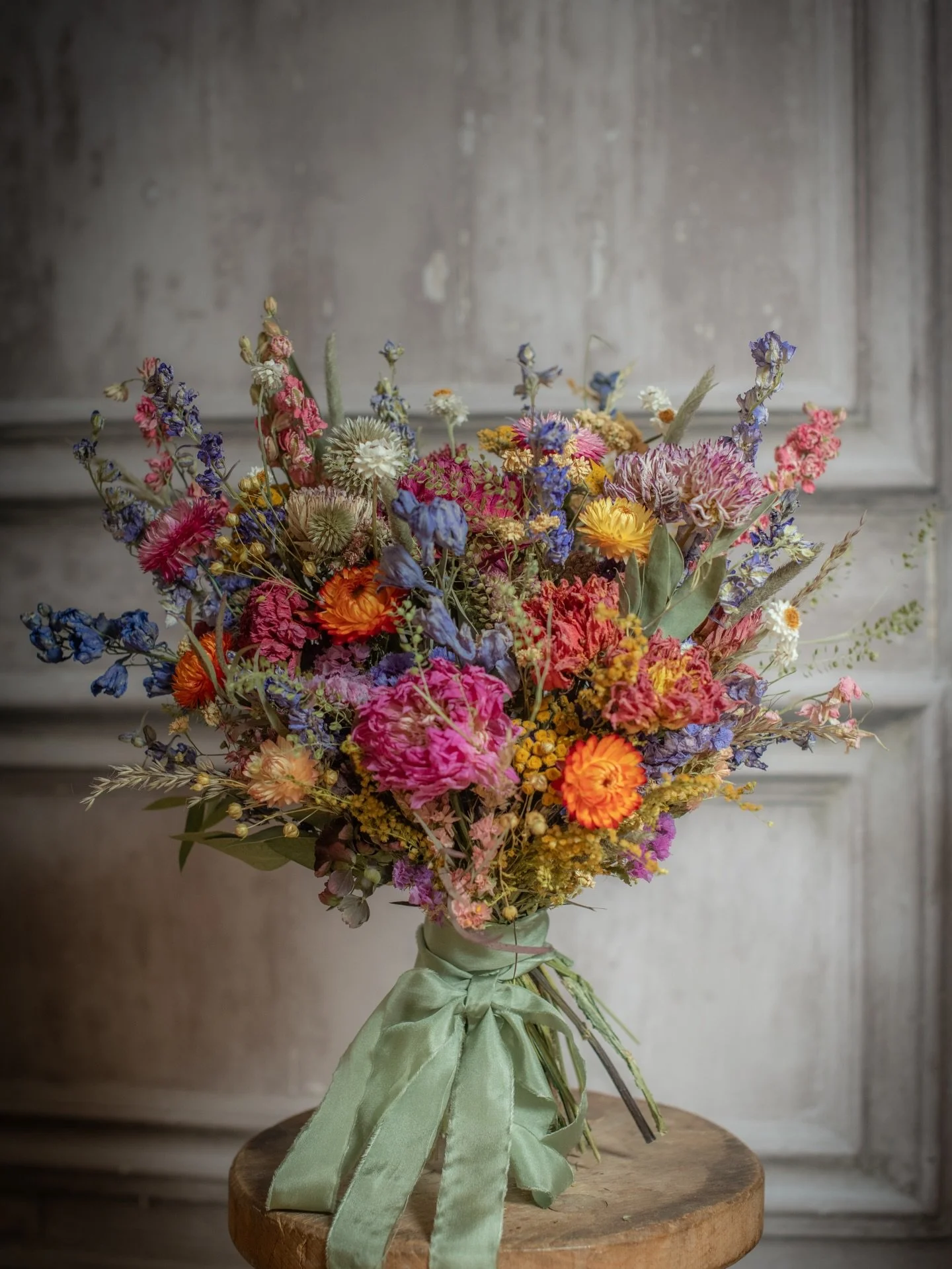 Bouquet for Beth 💐 
Wishing Beth &amp; Chris a wonderful wedding day today!! 
.
.
.
Dried flower bridal bouquet in bright, warm colours| bespoke wedding flowers in from natural dried flowers 
.
.
#brightdriedflowers #driedflowerwedding #bridalbouque