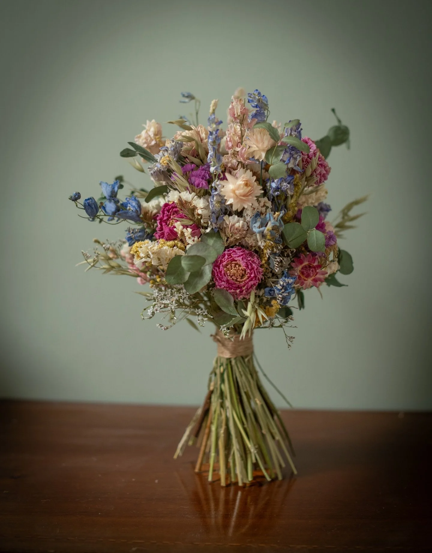 Pretty, colourful wedding flowers for Ali &amp; family. I&rsquo;d describe them as pastels with a few pops!  Loveliness 🥰 Wishing you all a beautiful wedding day 💐
.
.
.
.
Dried flower wedding bouquet, wands, buttonhole and headband | luxury Britis
