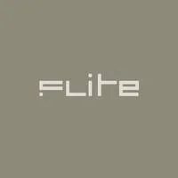 Gray background with the word 'elite' in lowercase white letters.