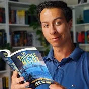 Jed Herne youtube logo Person holding a book titled 'Thunder of the Internet' in a room with bookshelves.