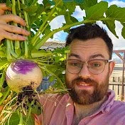 Cilinary Garden youtube logo Man with glasses taking a selfie next to a large purple and white turnip plant