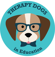 Logo featuring a dog with glasses and a bow tie, with the text 'THERAPY DOGS in Education' in a circular layout.