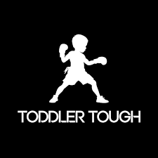 Silhouette of a young girl in a boxing stance with her fists up, above the text 'Toddler Tough' on a black background.