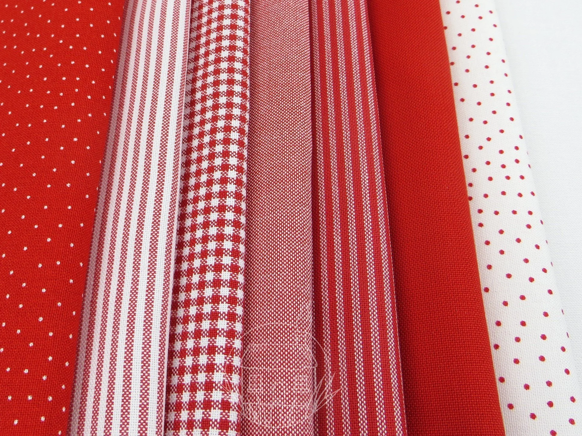 elmhirst-fabrics-new-red-bundle-westfalenstoffe-logo.jpg