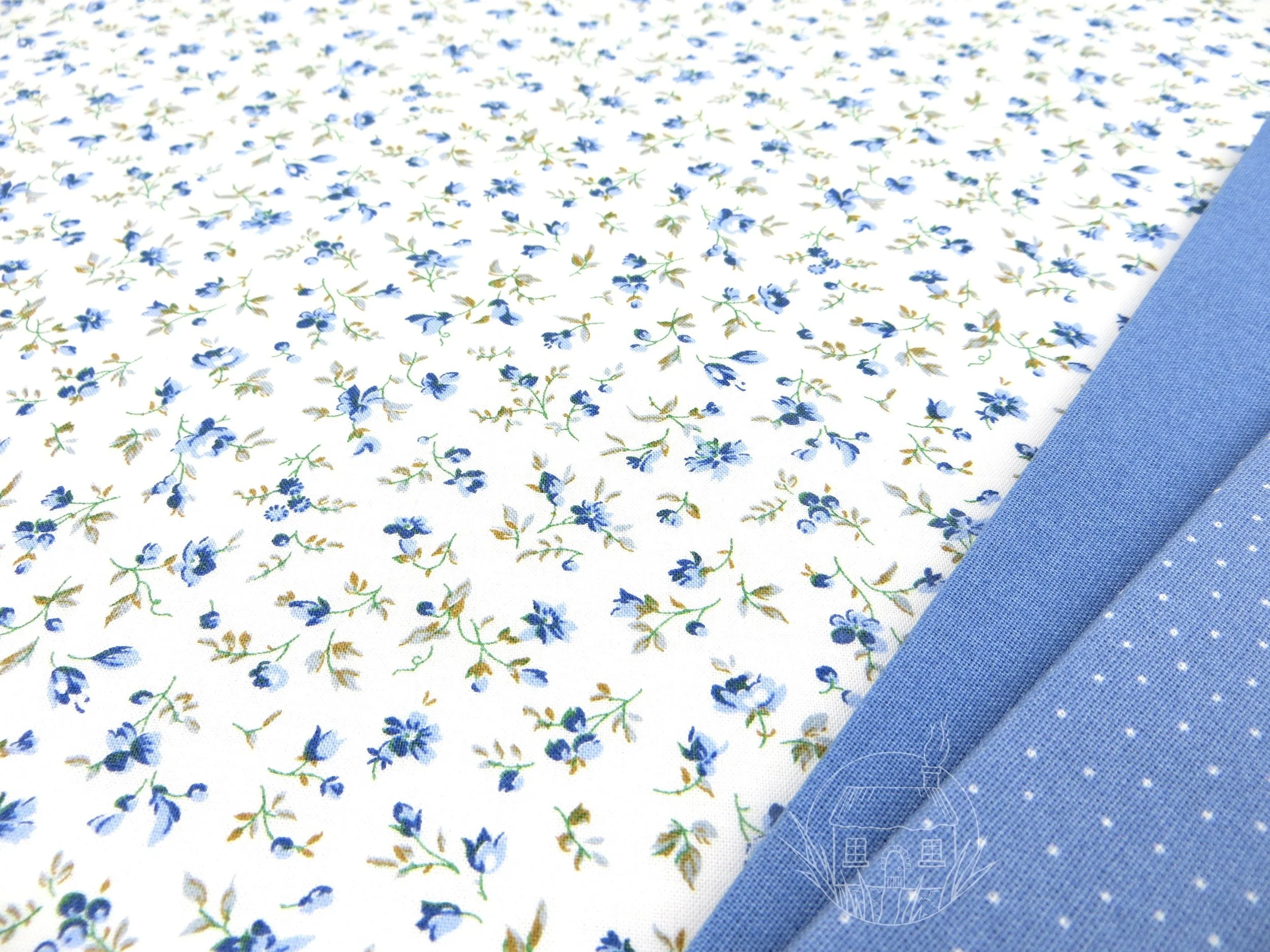 elmhirst-fabrics-ditsy-blue-floral-fabric-014006905-westfalenstoffe- logo-1.jpg