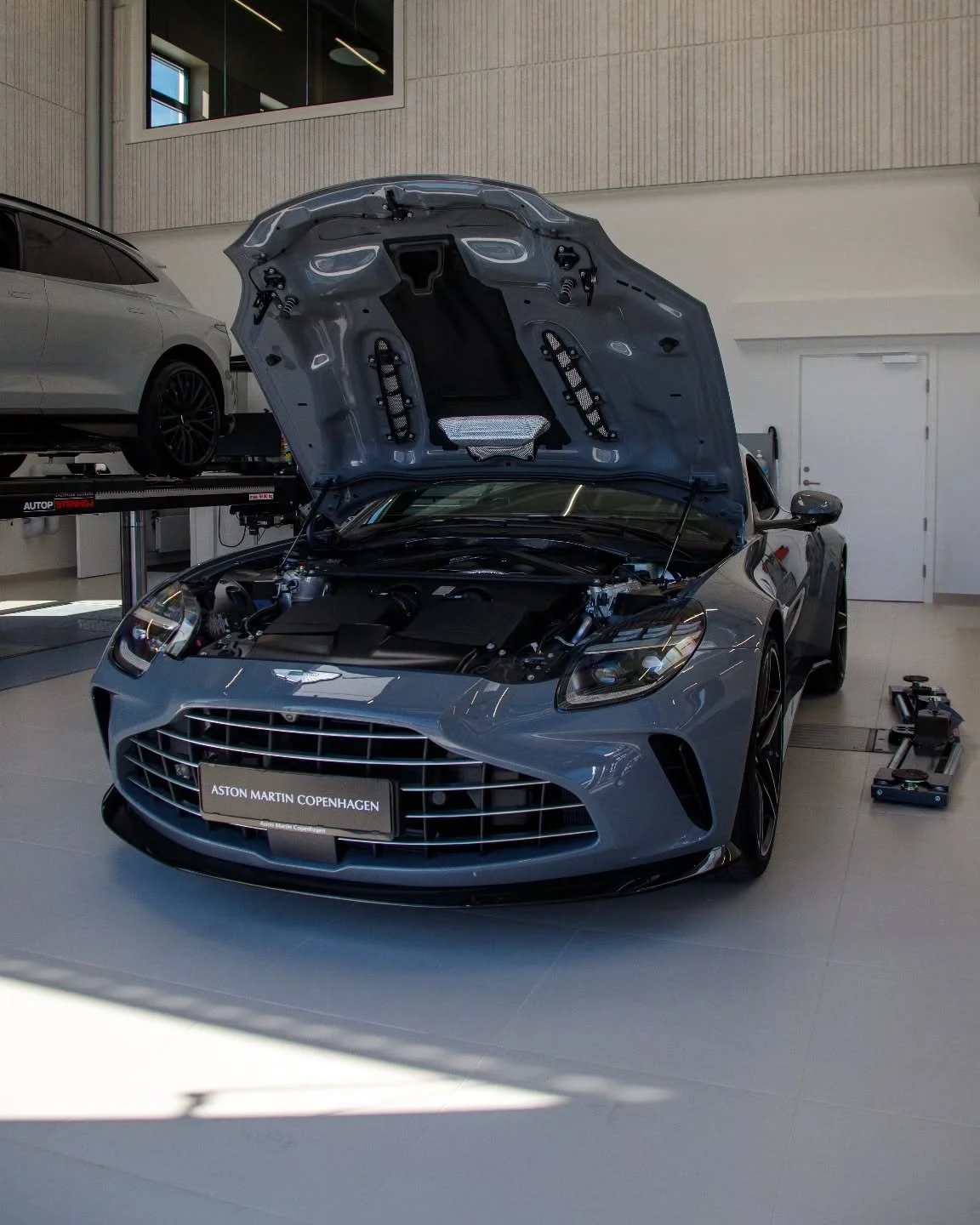 Power, hidden beneath perfection.

This is where elegance meets engineering &mdash; a reminder that beauty and performance can exist in the same place.

Built to be seen.
Engineered to be felt.

📍 Aston Martin Copenhagen
📷 Canon R5 Mark II
🔎 RF 28