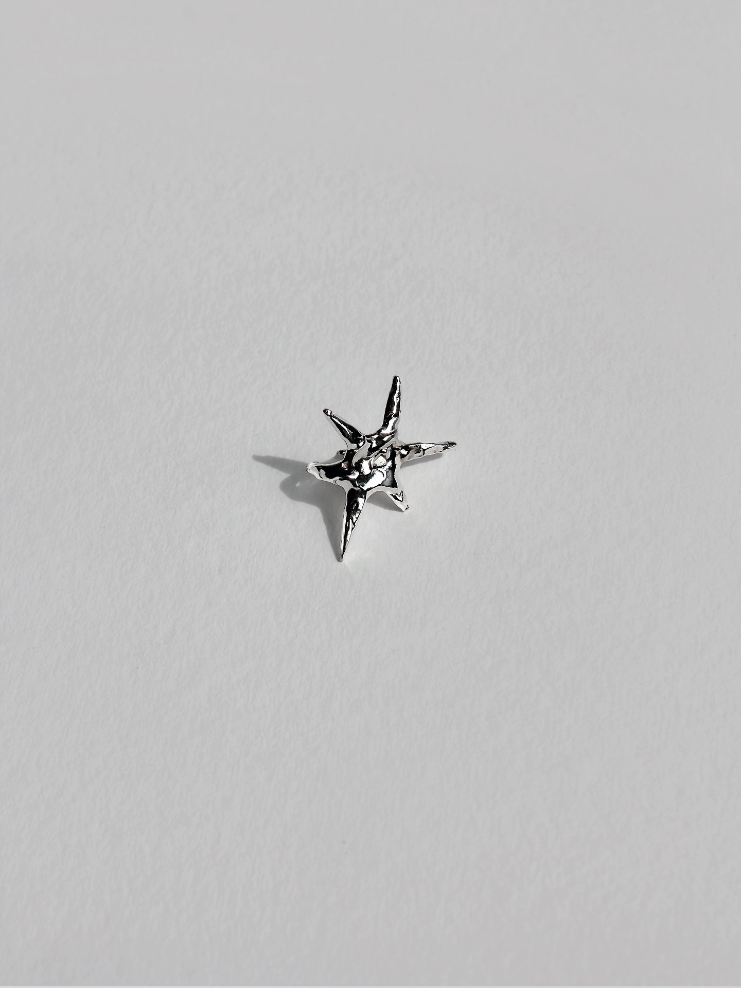 +star_ear_cuff_in_silver.jpg