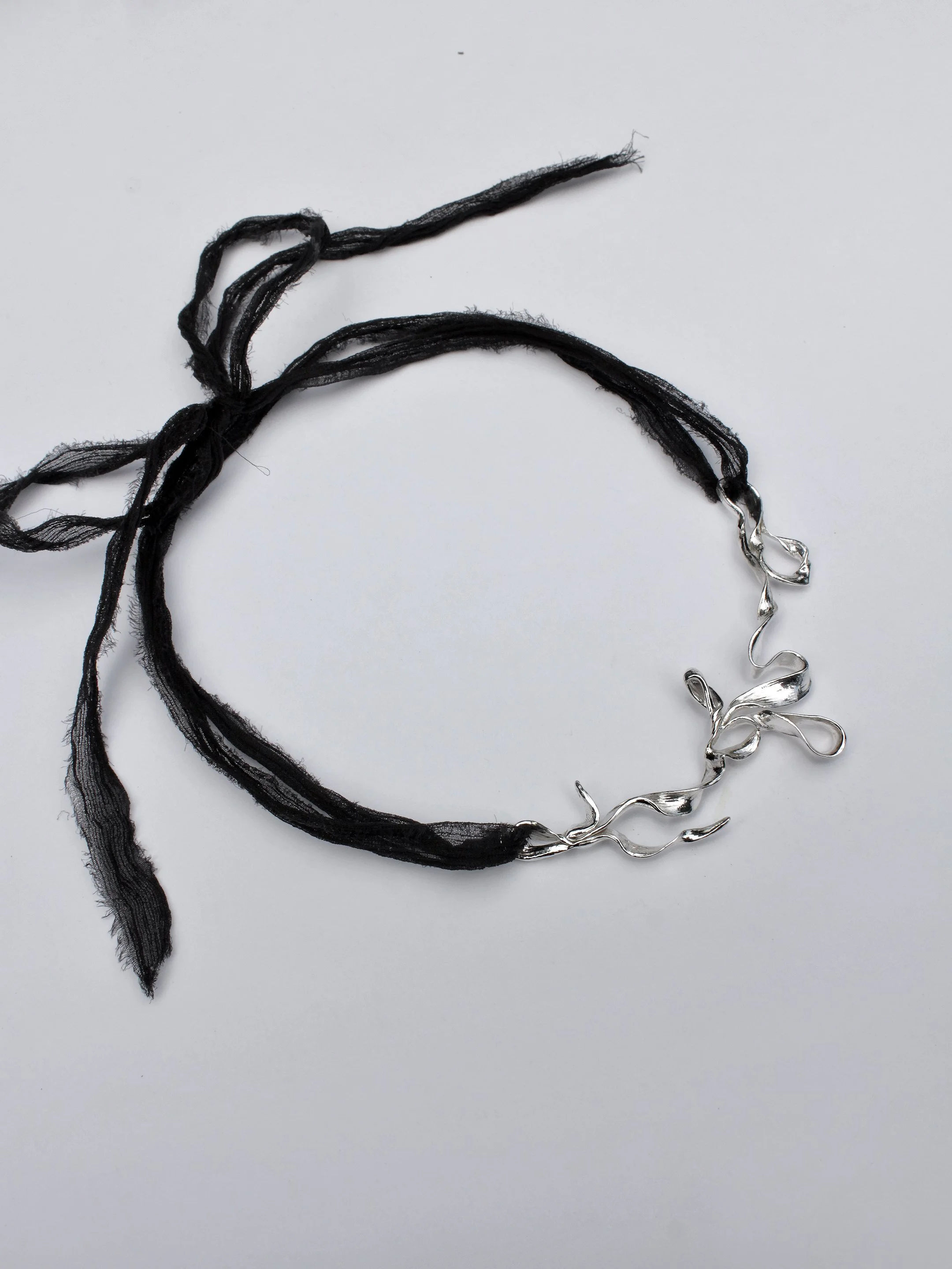 silver drape necklace by LLY ATELIER.jpg
