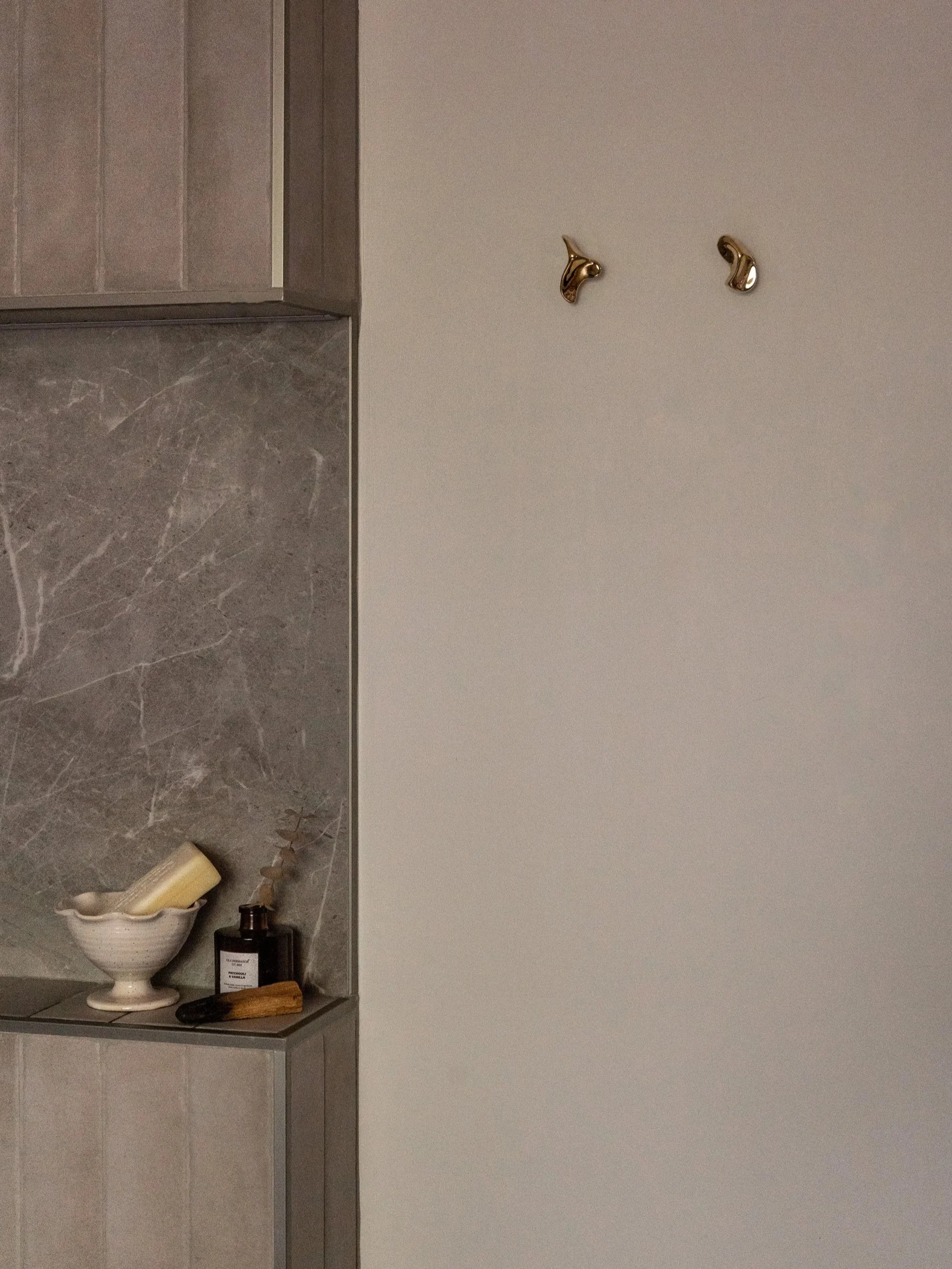 sculptural brass hooks by LLY ATELIER photo by Alexandra Pelletier