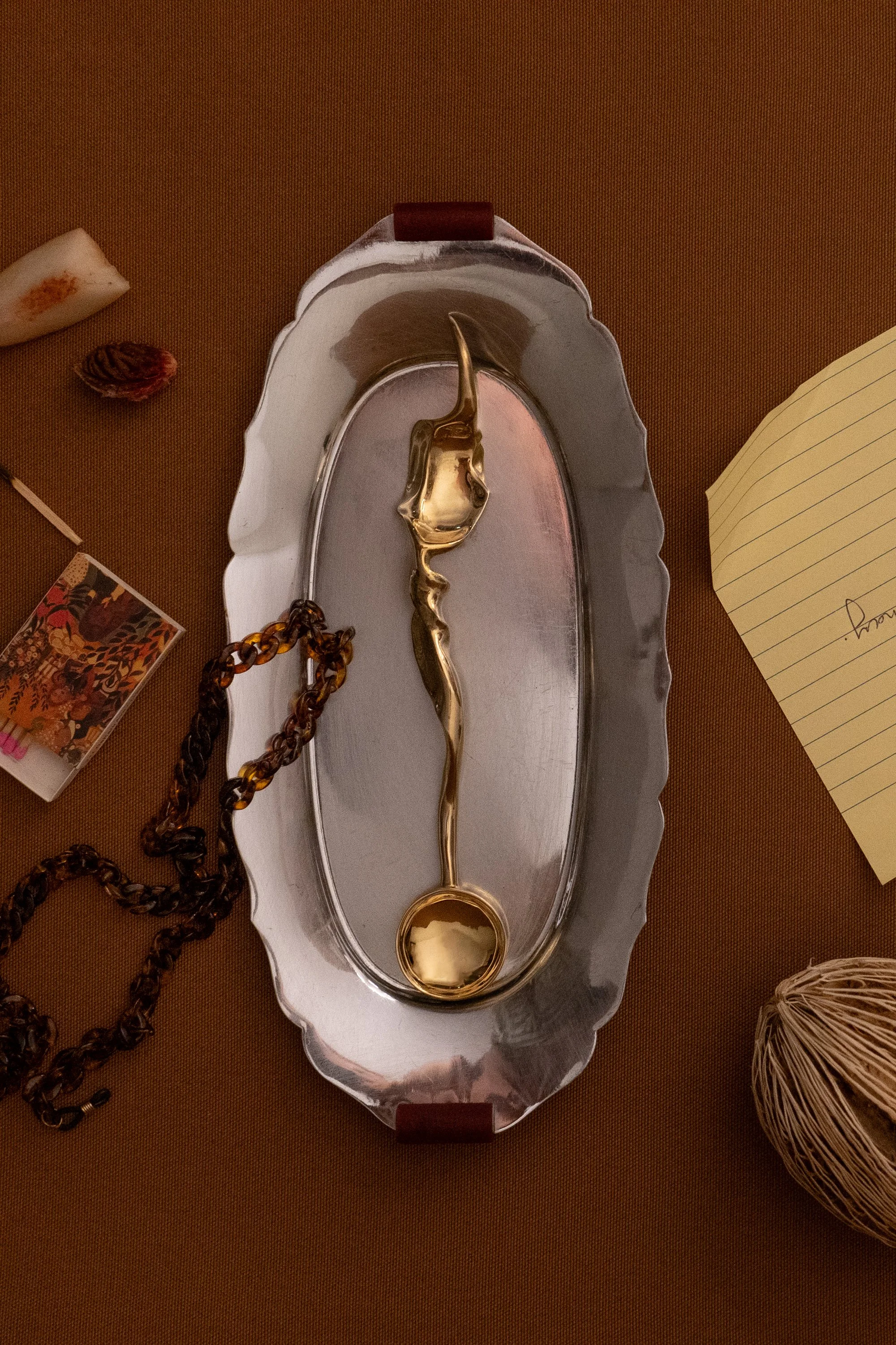Telson spoon in brass by L.L.Y. Atelier photo by Alexandra Pelletier