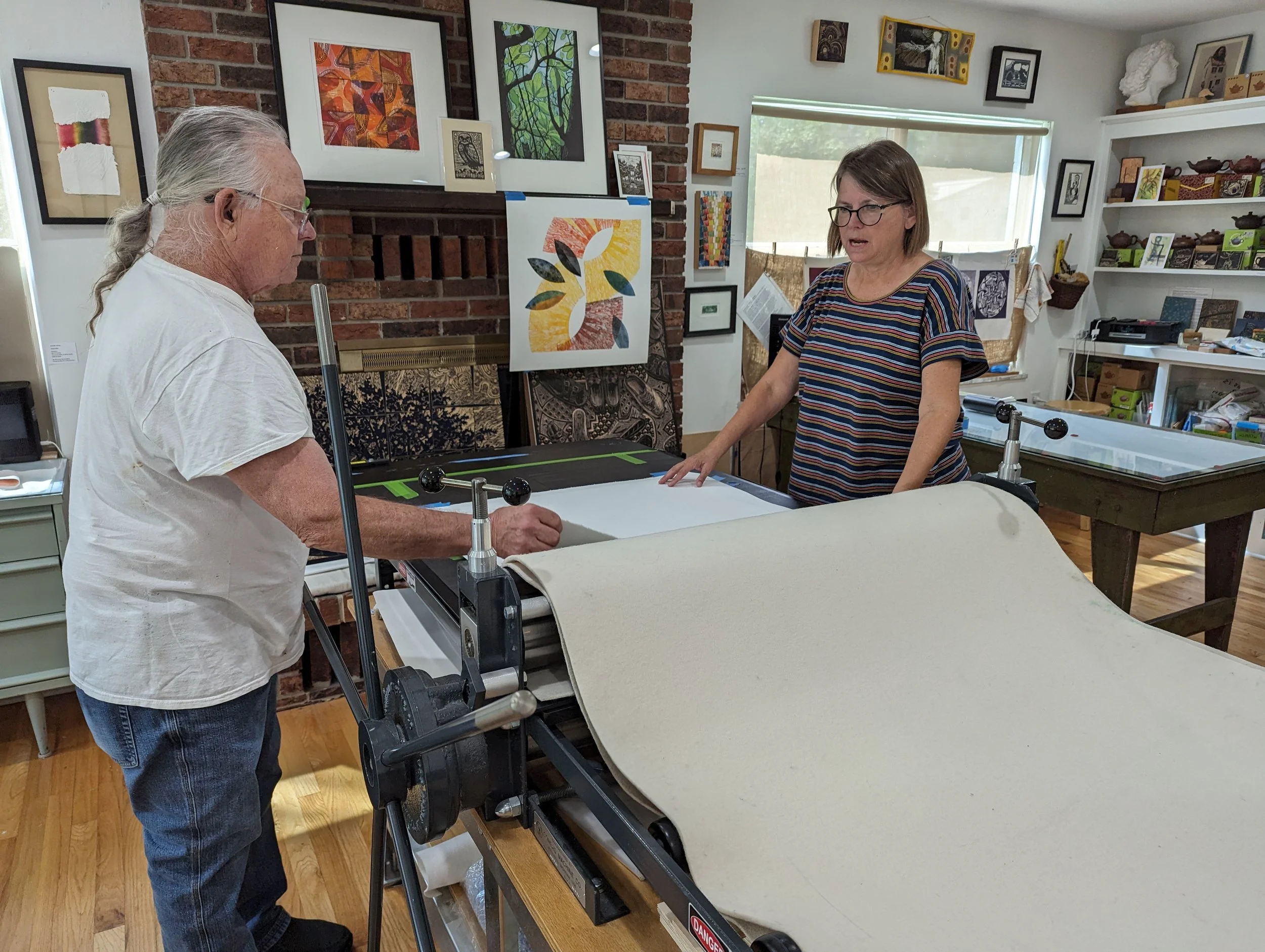 Harper Printmaking Studio with Jennifer teaching on the large press