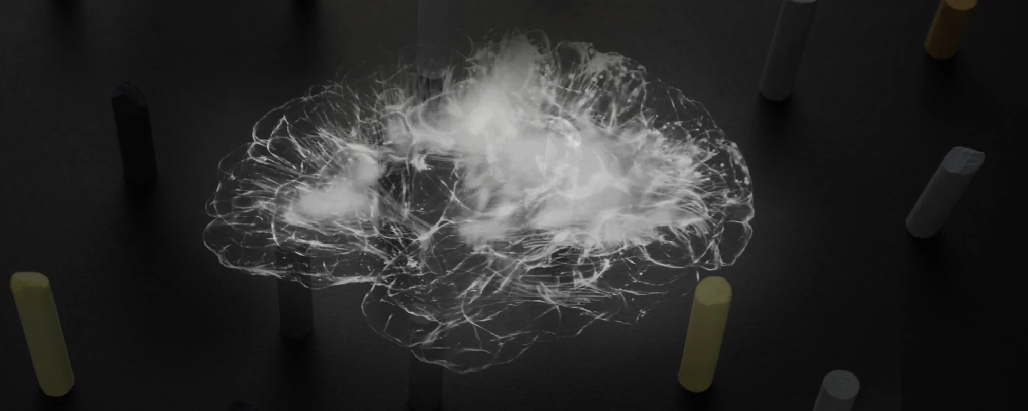 brain glow with chalk sticks in background