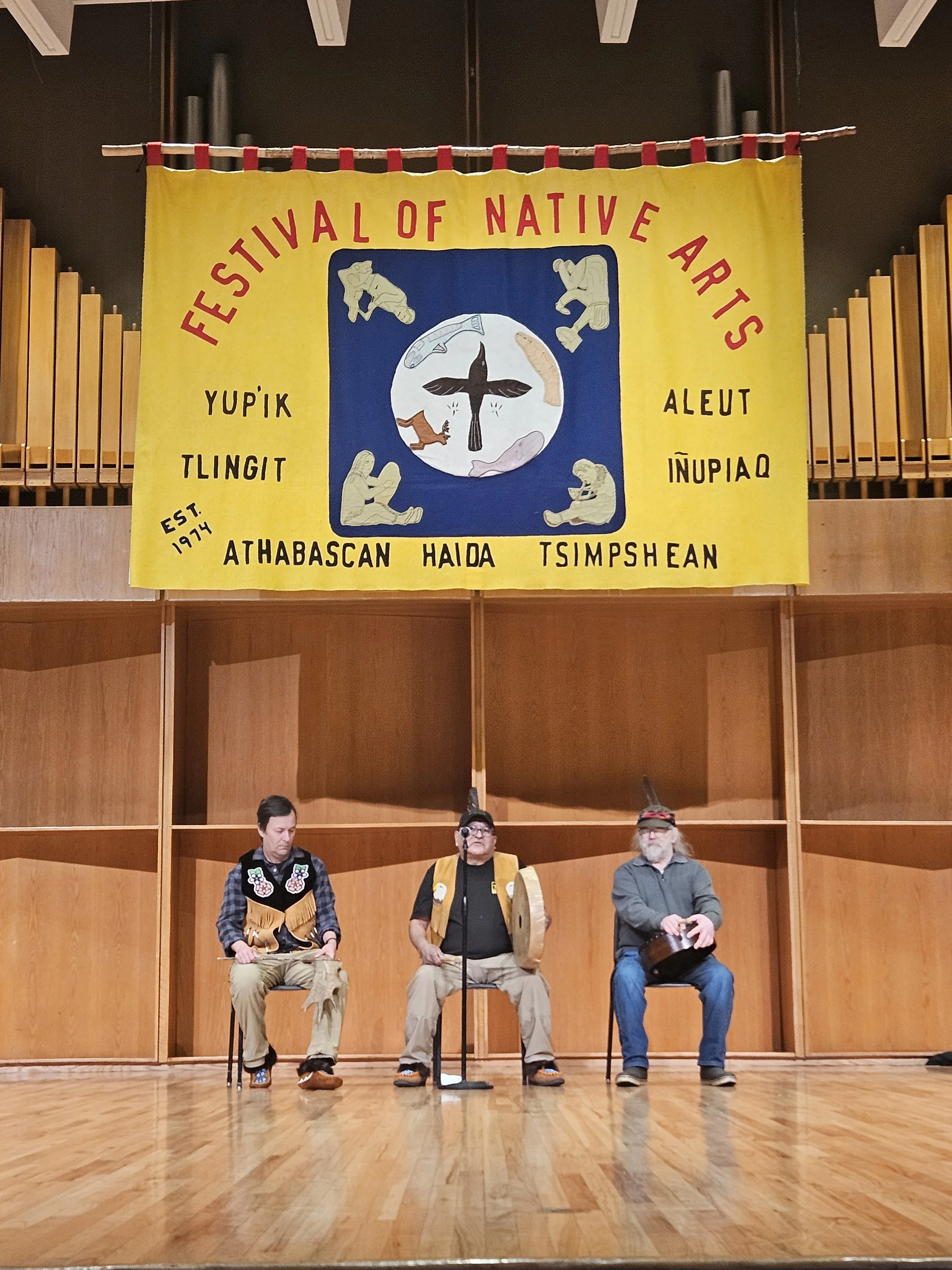 Photo by Jonathan Wasilewski - A group led by Pete Peter (middle), Dinjii Zhuh Pete ats'a Vitjyaa naii khaa, performs a Gwich'in language song at the Festival of Native Arts in the Davis Concert Hall February 27.