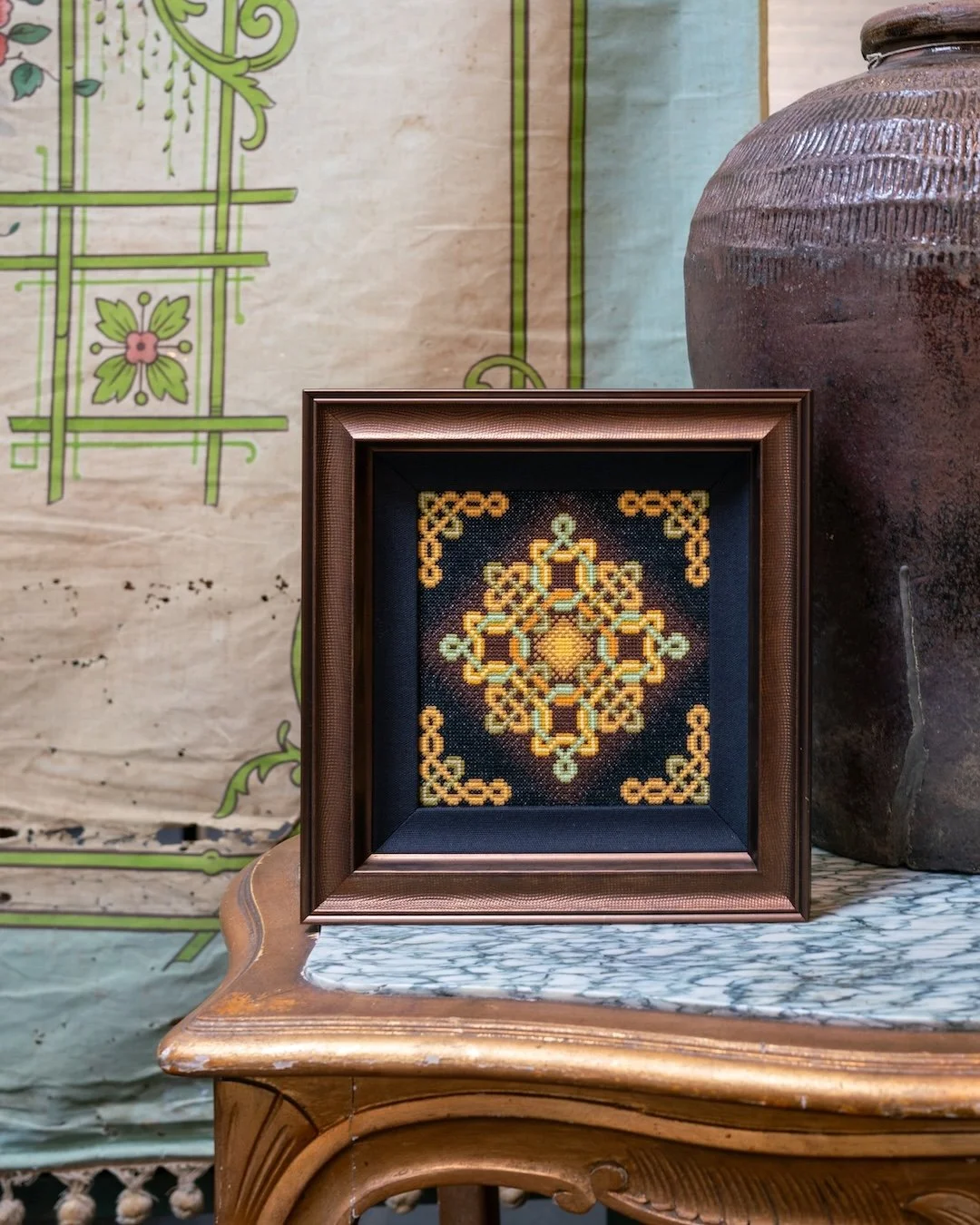 There&rsquo;s something about winter that calls for warmth and depth. This rich bronze frame brings a cozy, collected feel&mdash;highlighting every stitch with effortless vibes. #wintervibes #chicagowinters #chicagoframeshop #bestchicagoframers #cust