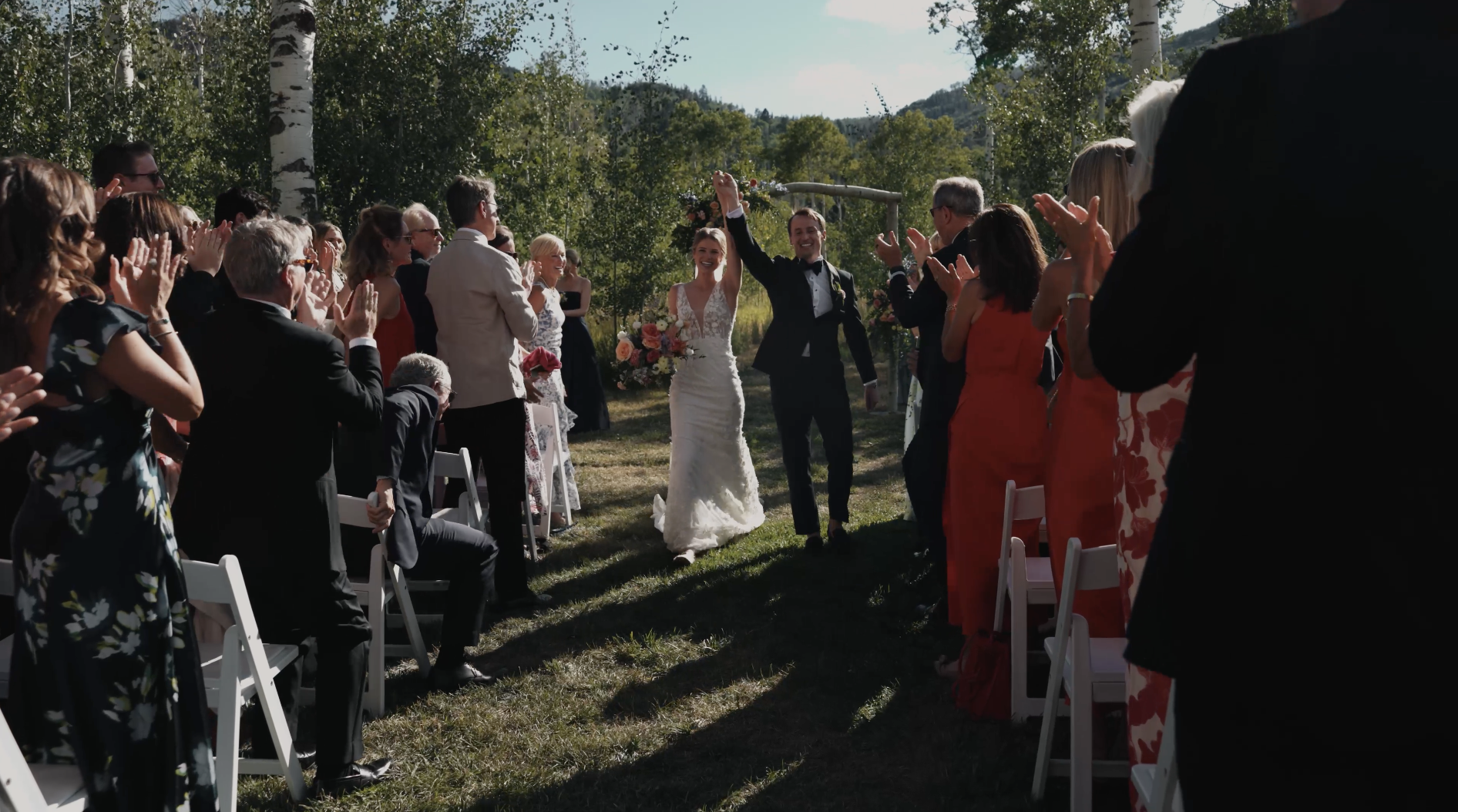 Flying Diamond Ranch wedding ceremony with bride and groom in Steamboat Springs, Colorado captured by cinematic wedding photographer