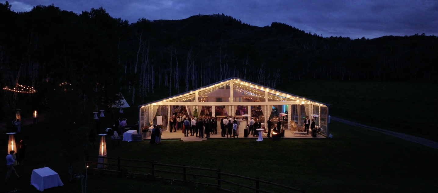 Drone shot of tented wedding reception at Flying Diamond Ranch in Steamboat Springs, Colorado