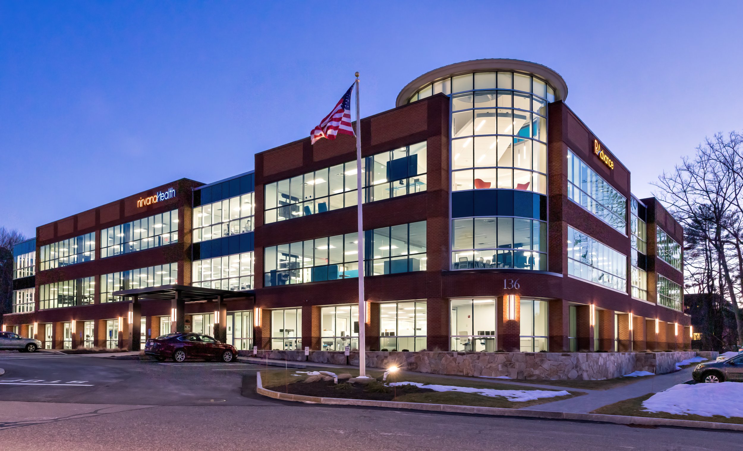Tess-Slotted Large Scale Exterior Wall Sconce on Medical Building