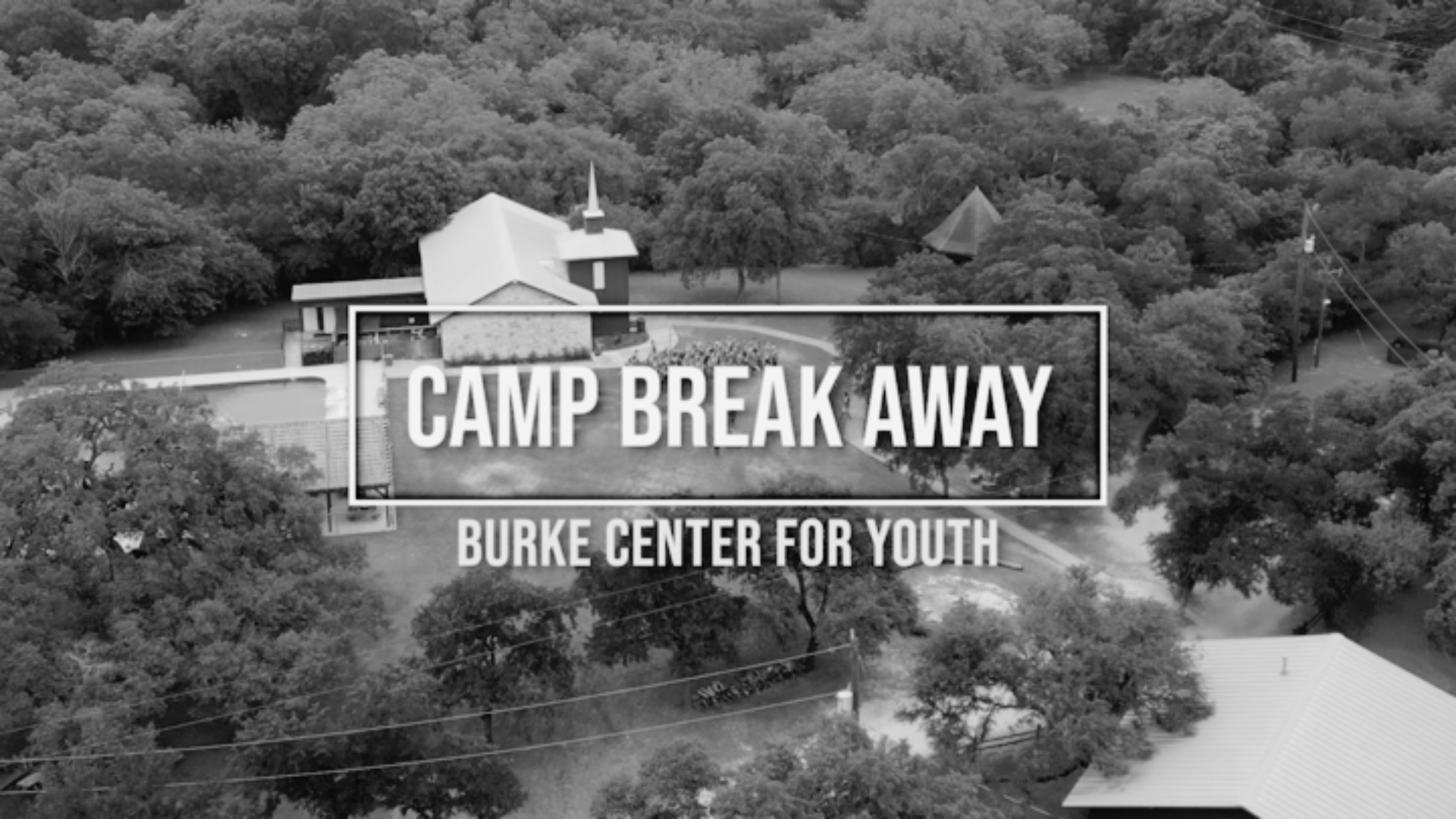 Aerial view of a summer camp with a swimming pool, small building, and large group of people, surrounded by trees and hills, with the text 'Camp Break Away' and 'Burke Center for Youth' overlaid.