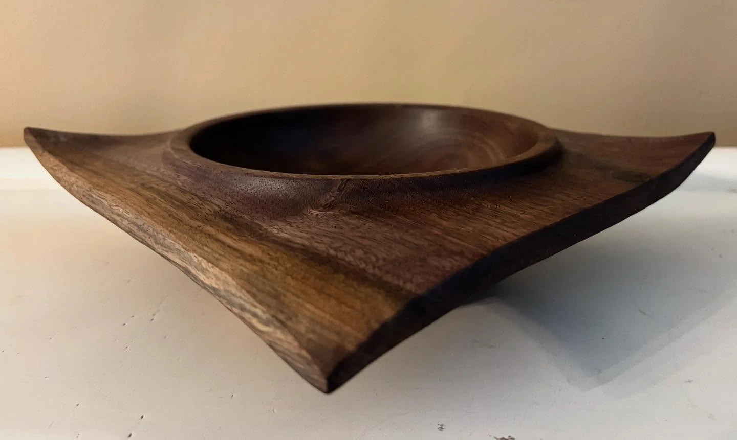 Black Walnut winged four corner bowl.  #wingedbowl #woodturningcommunity #woodturning #walnutbowl #woodturning #woodturnersofinstagram #woodlatheprojects