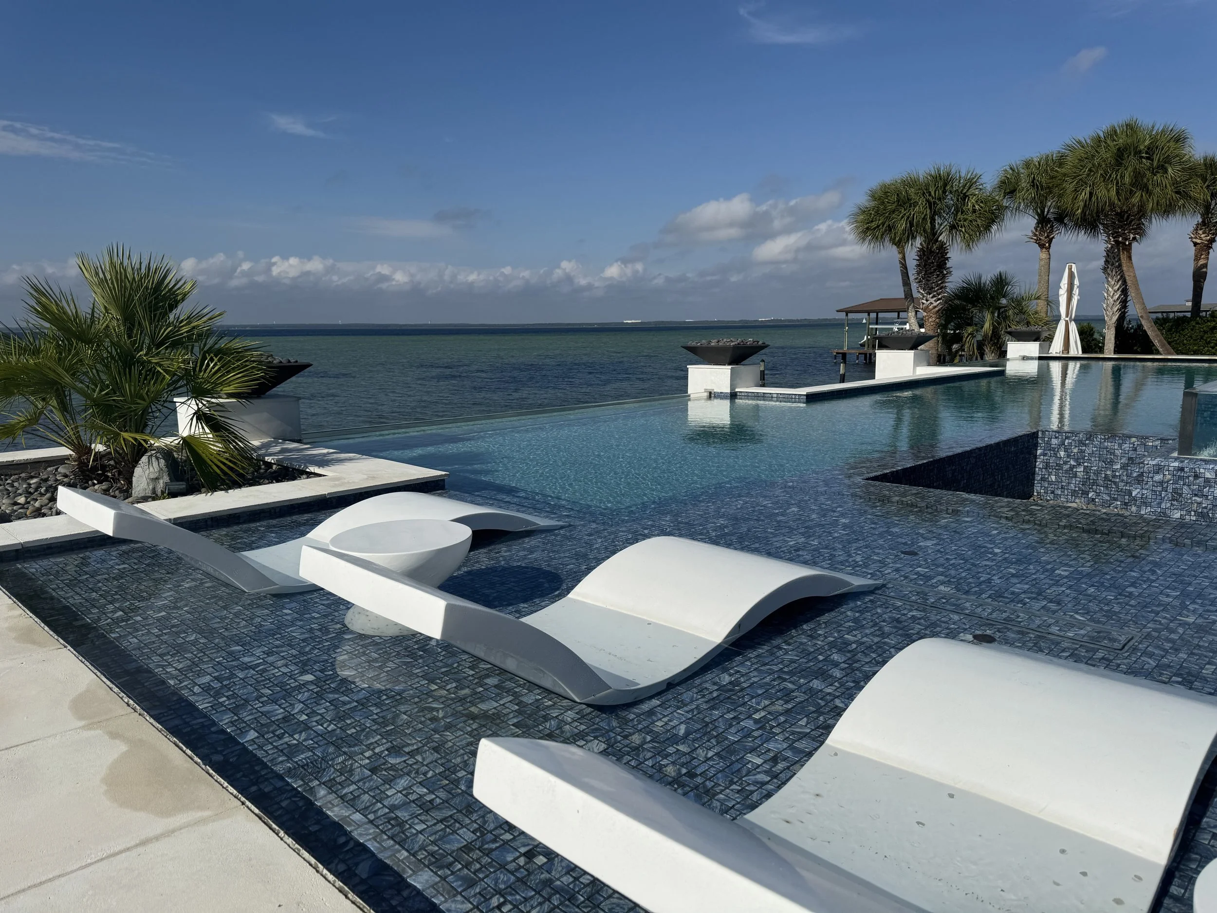 Imagine sitting on these lounge chairs and looking out to the bay everyday