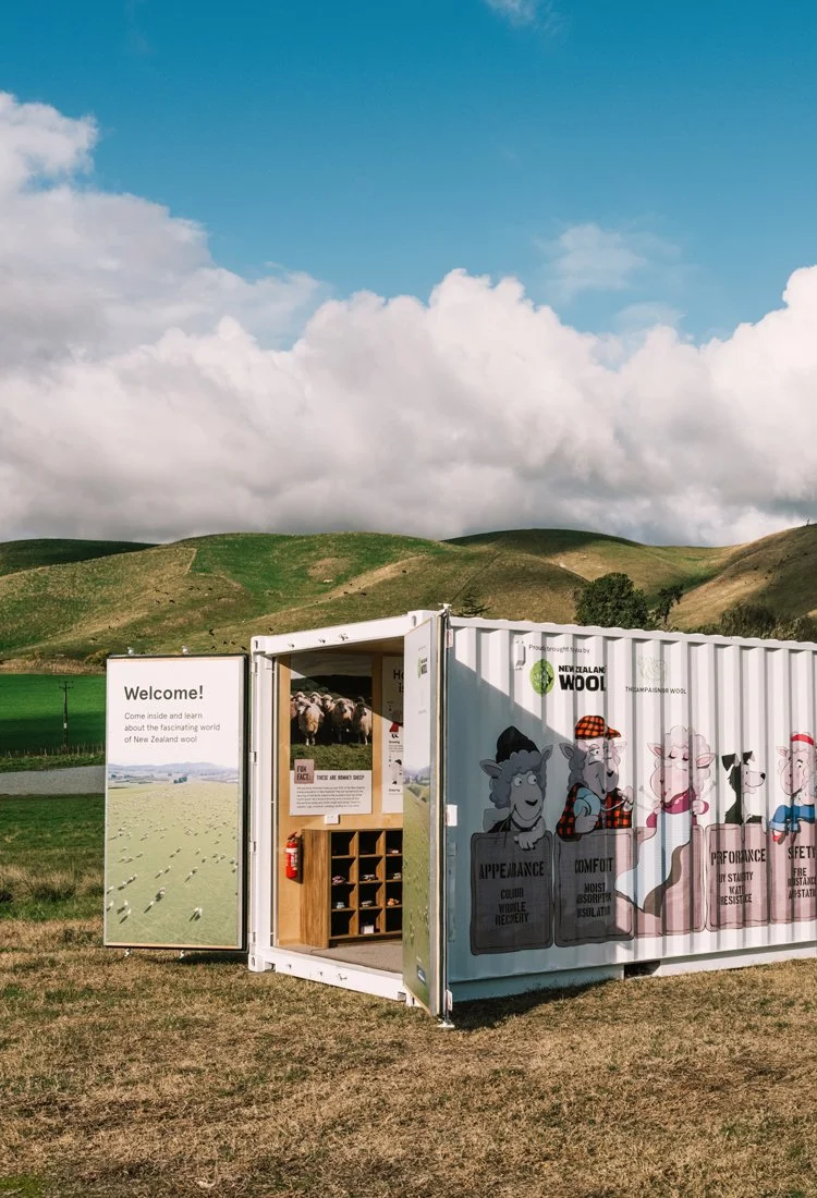 Image of Wool in Schools container with doors open in rural location