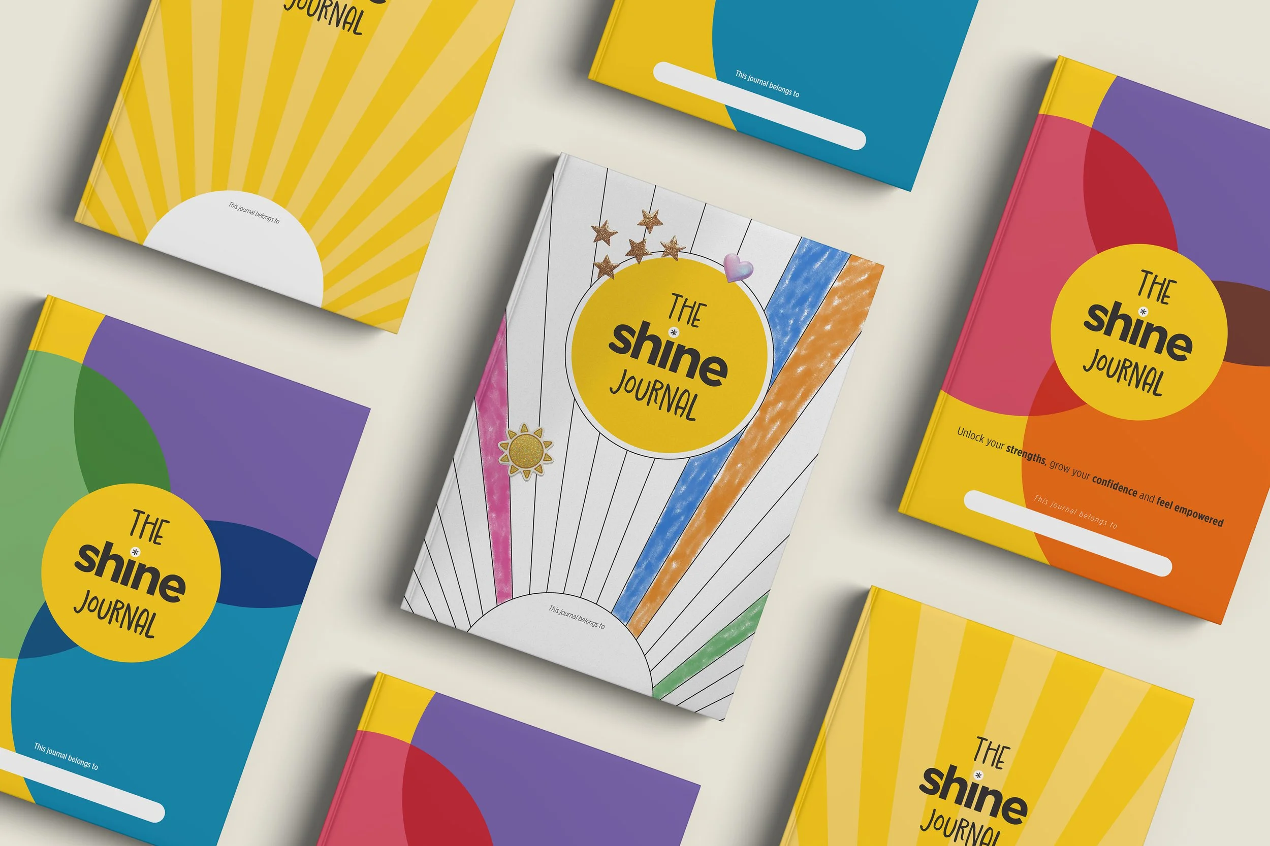 Montage showing 4 years of Woodford House Shine Journal cover designs