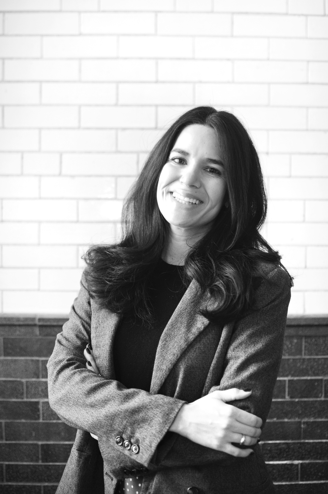 Clarissa De La Cruz, Designer at Siren Betty Design, professional headshot.