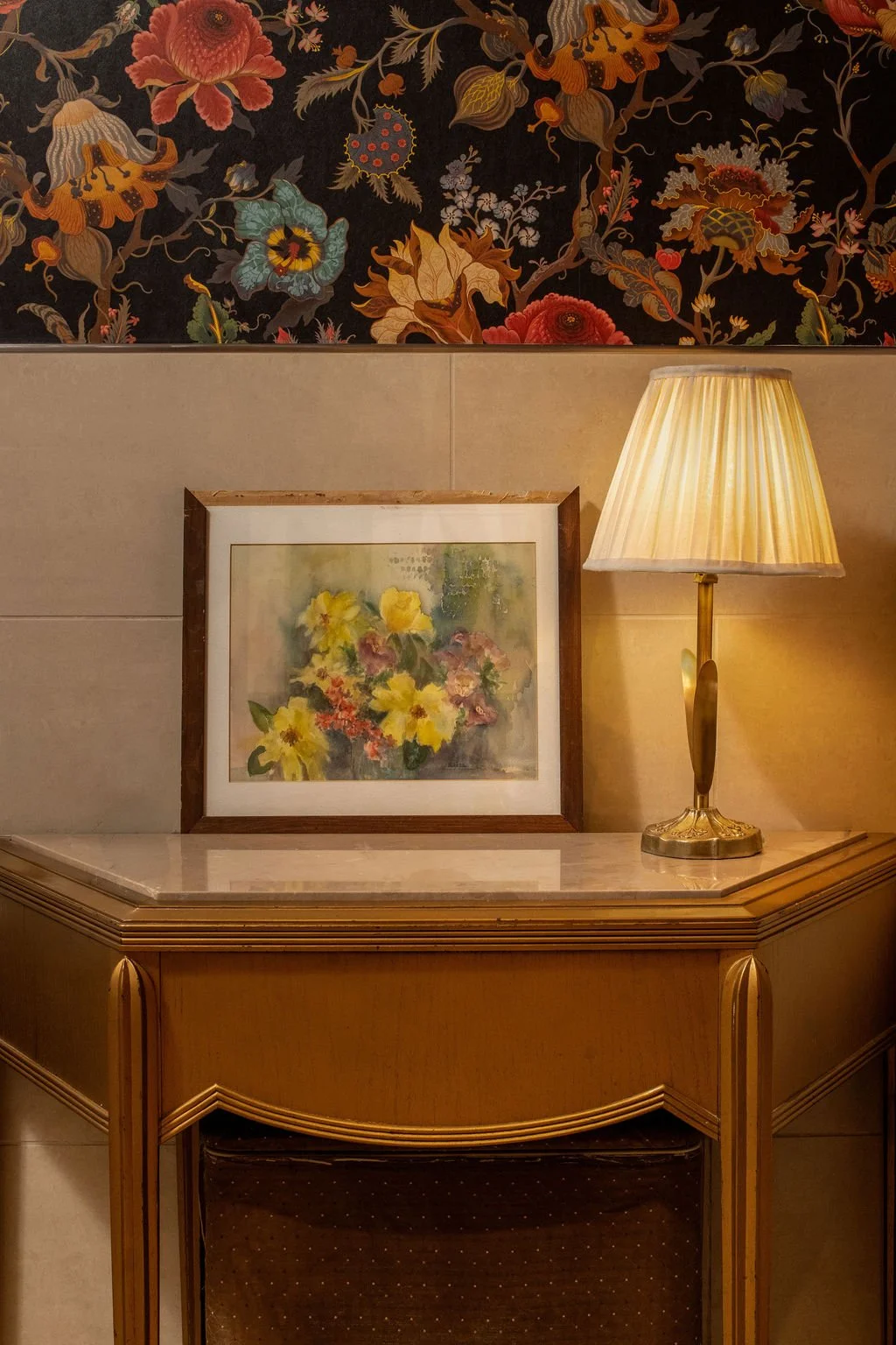 Floral artwork, pleated lamp and patterned wallcovering in the Eaves hospitality interior by Siren Betty Design.
