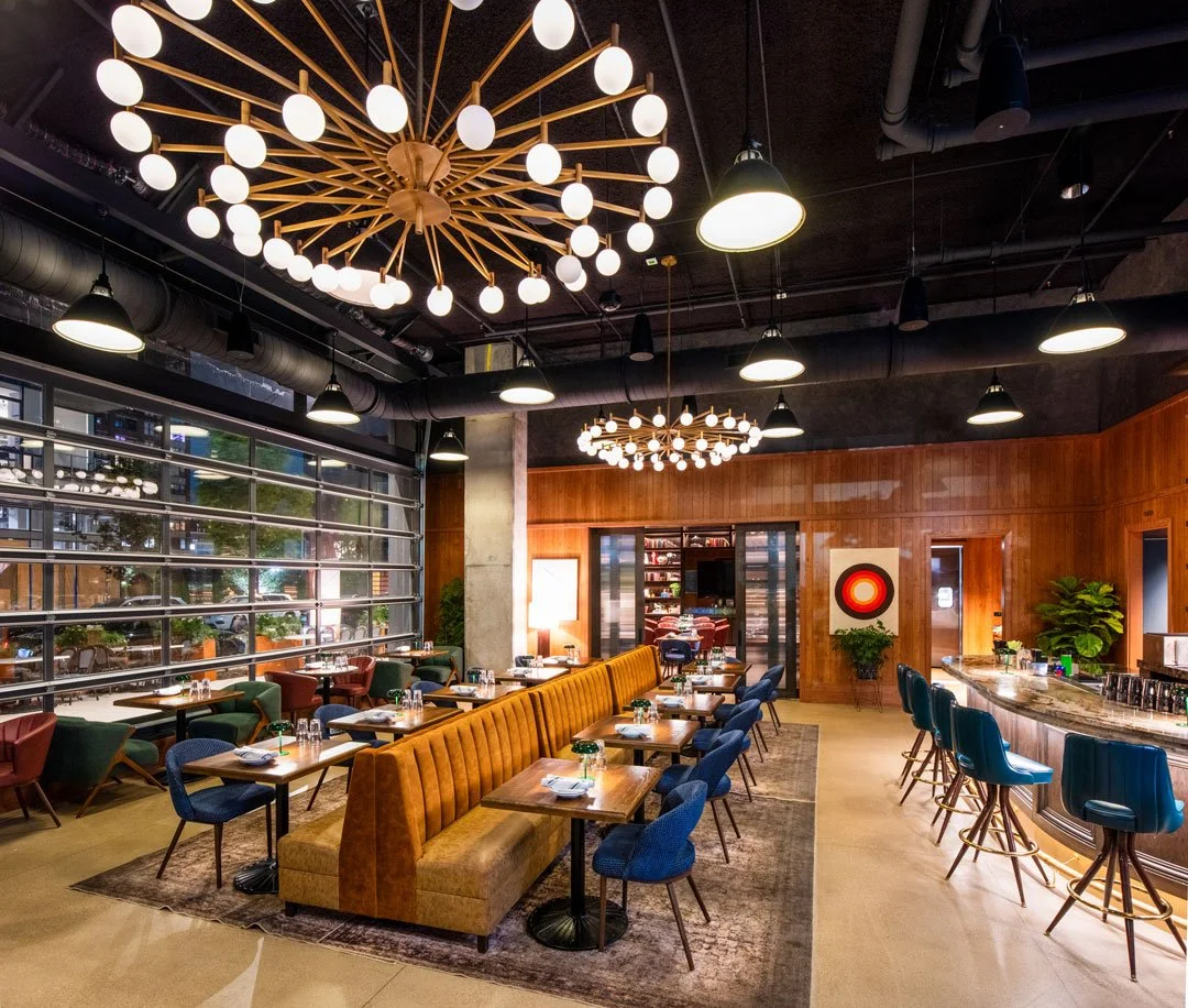 Dj's Great Room dining and lounge seating by Siren Betty Design.