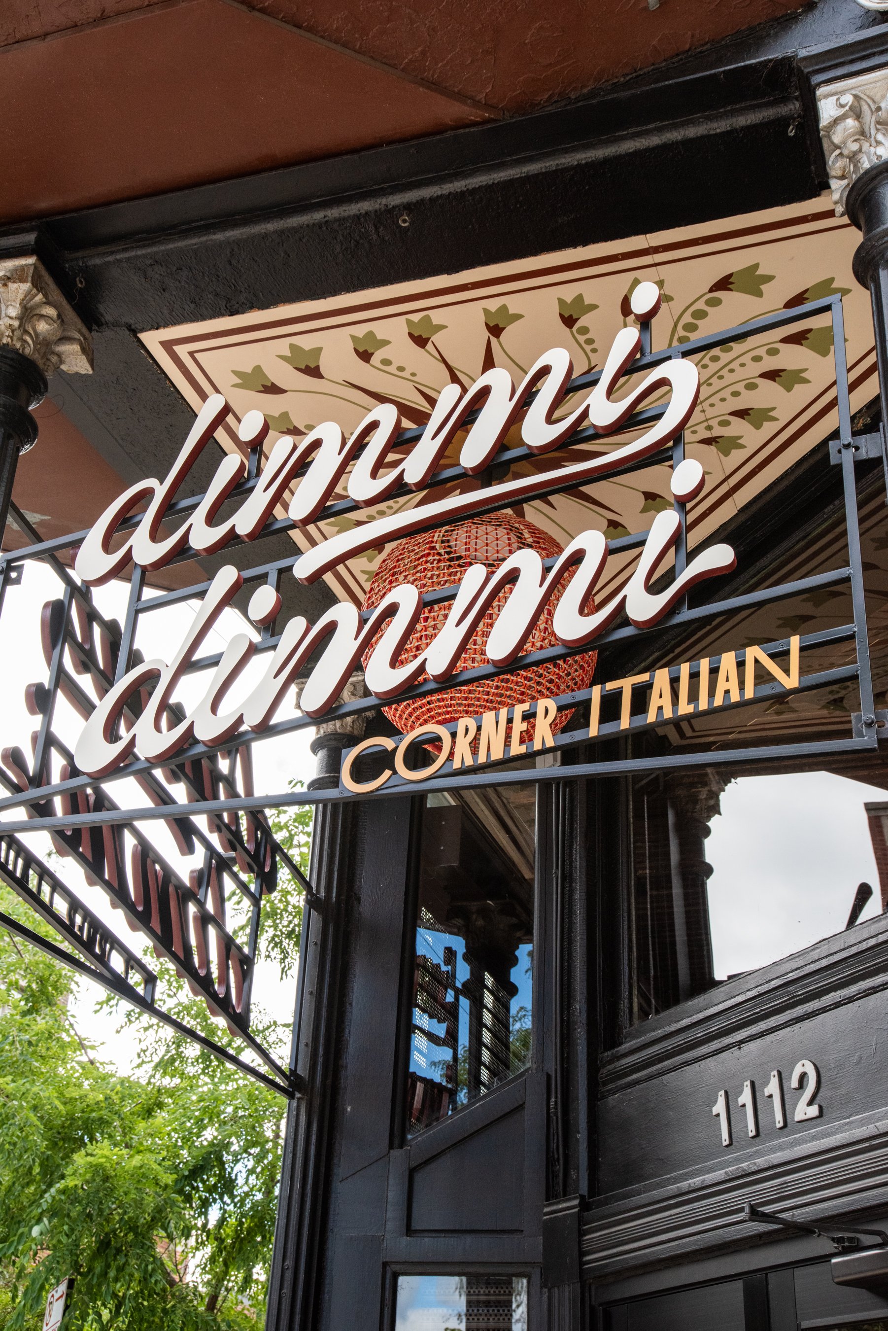 Arched entryway detail at Dimmi Dimmi restaurant showcasing custom interior by Siren Betty Design.