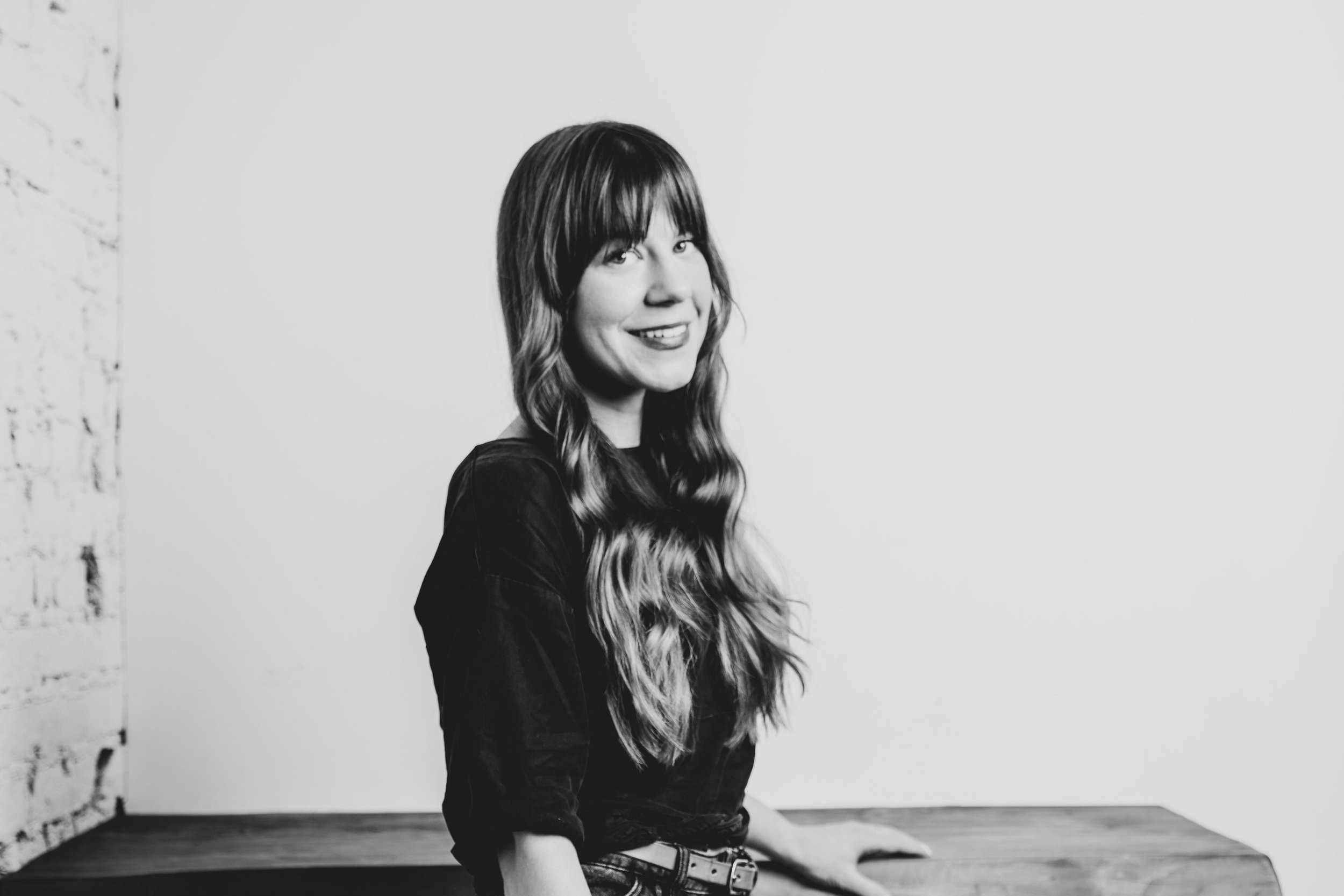 Angella Miller, Designer at Siren Betty Design, professional headshot.