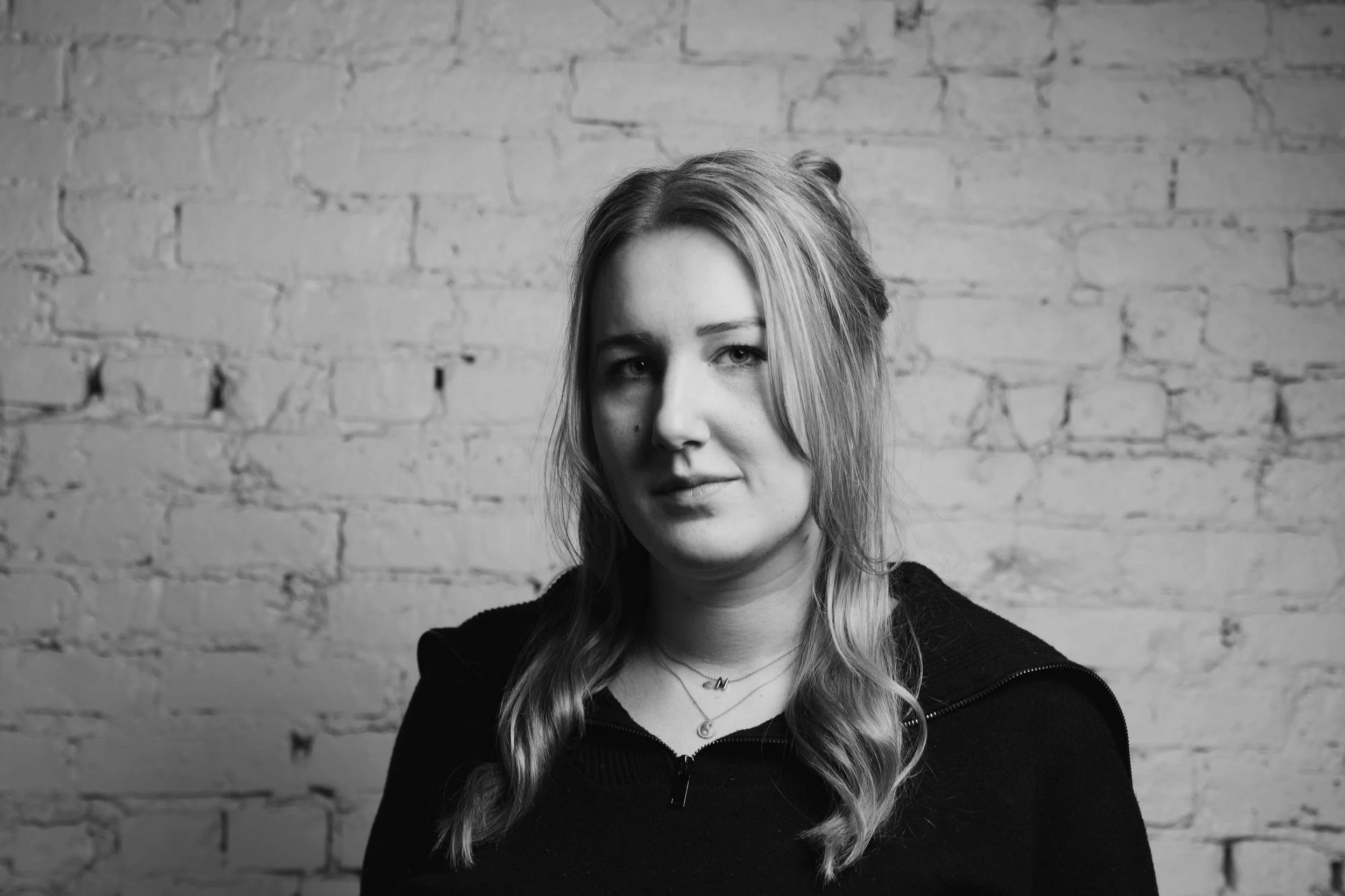 Noelle Saeger, Designer at Siren Betty Design, professional headshot.