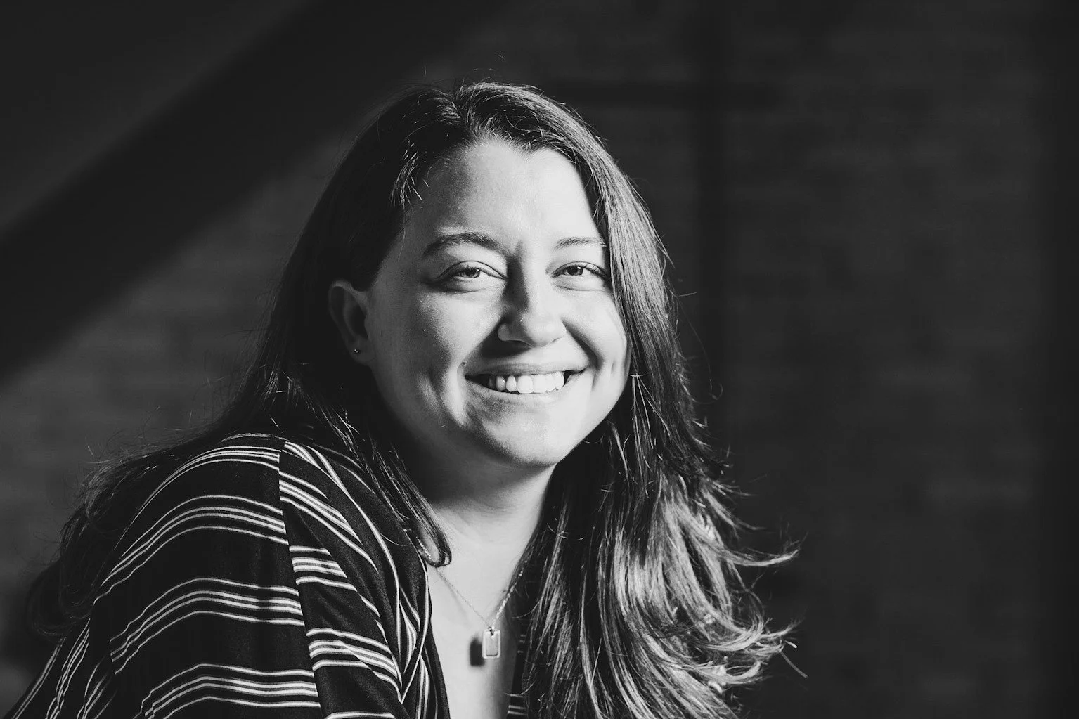 Sarah Kaufmann, Designer at Siren Betty Design, professional headshot.