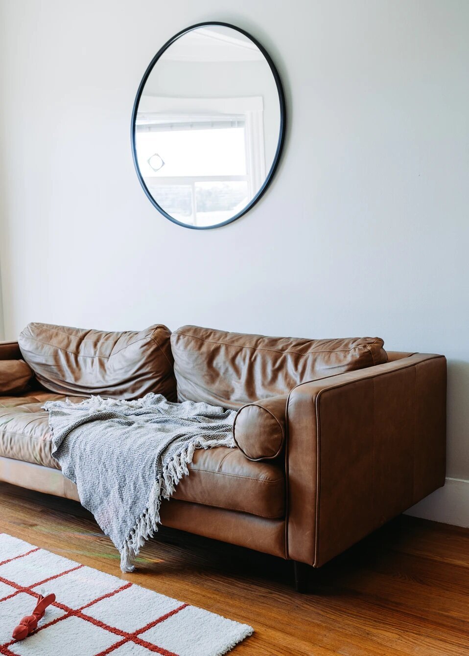Justin's brown leather couch — this one shows up in the Codex series, too! 