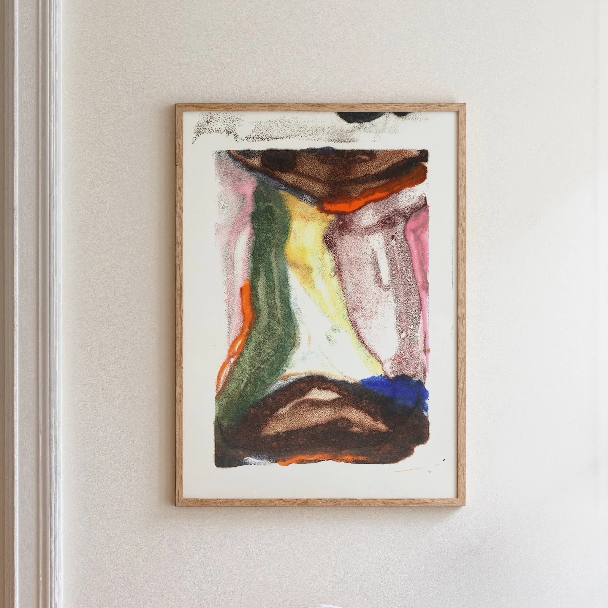 Ecotone by Melissa McGill displayed in a natural wood frame on a white wall, showing interlocking green, yellow, brown, burgundy, orange, pink, and blue forms.