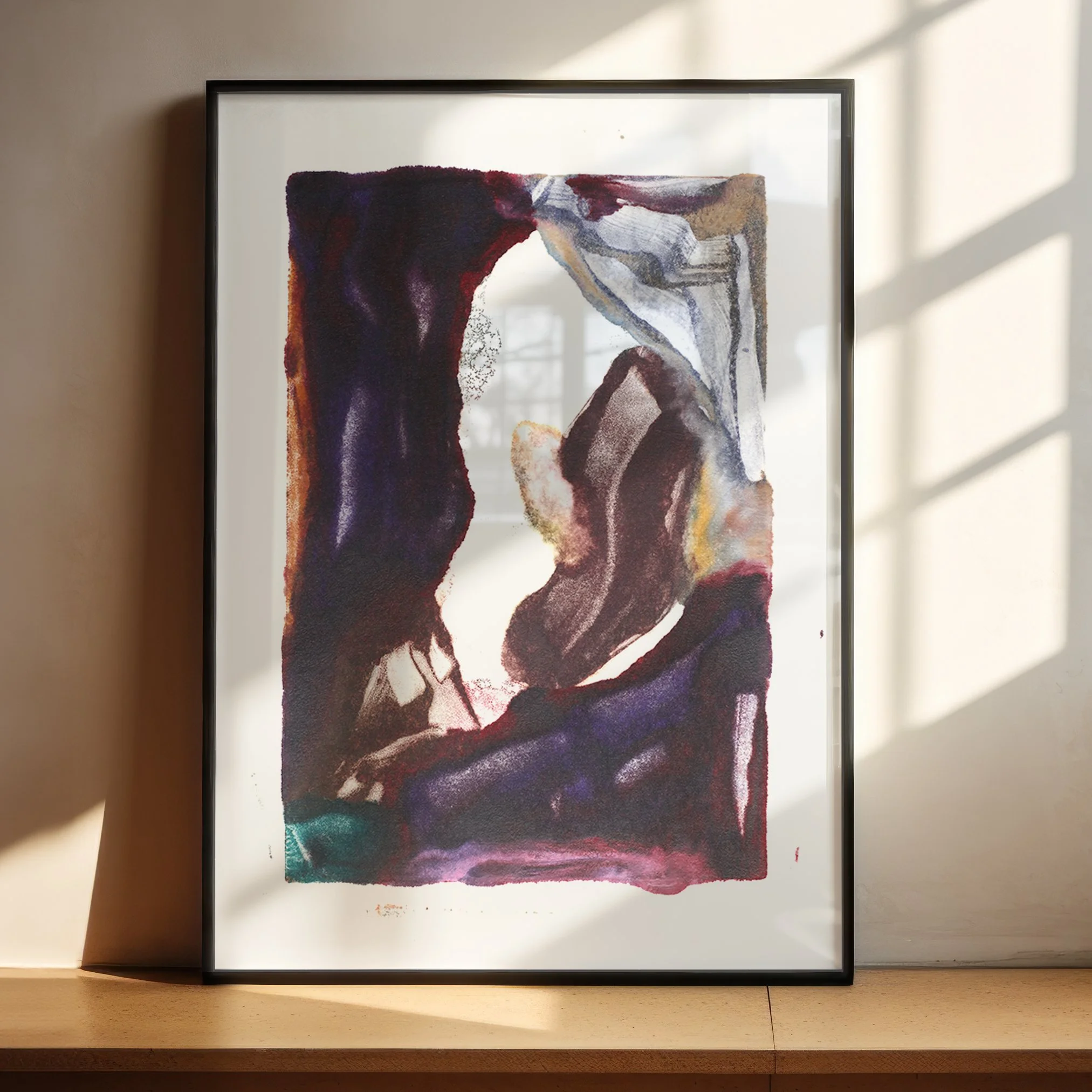 Threshold by Melissa McGill displayed in a black frame on a sunlit wood shelf, with violet, burgundy, brown, blue-gray, turquoise, and pink surrounding a luminous opening.