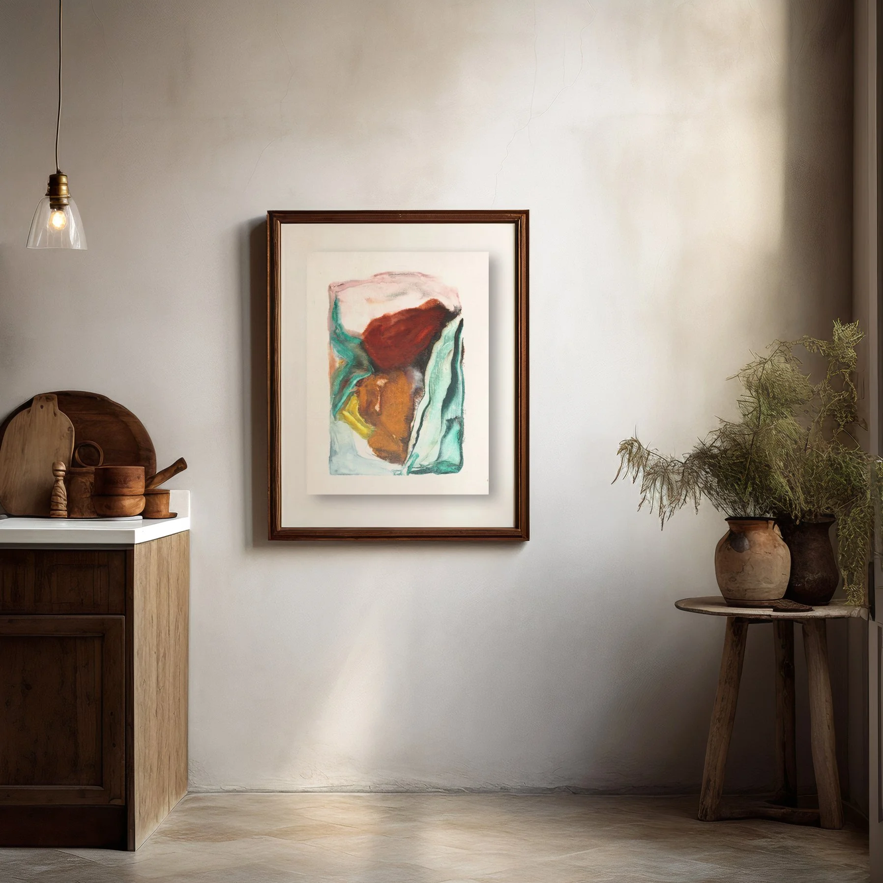 Basin by Melissa McGill displayed in a dark wood frame on a neutral wall between a wooden cabinet and a small table with ceramic vessels and greenery.