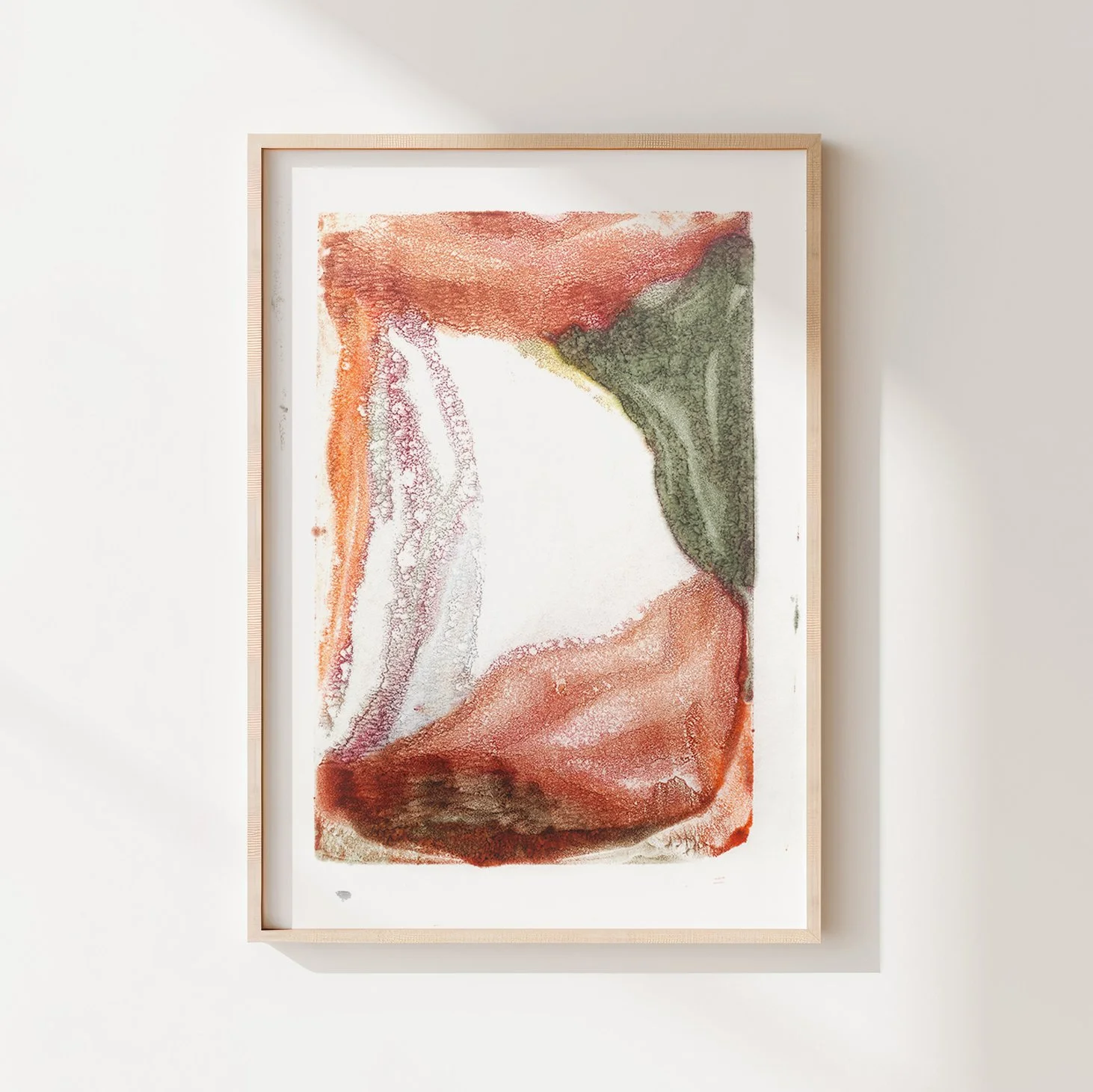 Weathering by Melissa McGill, abstract encaustic monotype on abaca paper with rust, terracotta, olive green, and pale gray forms, framed in natural wood.