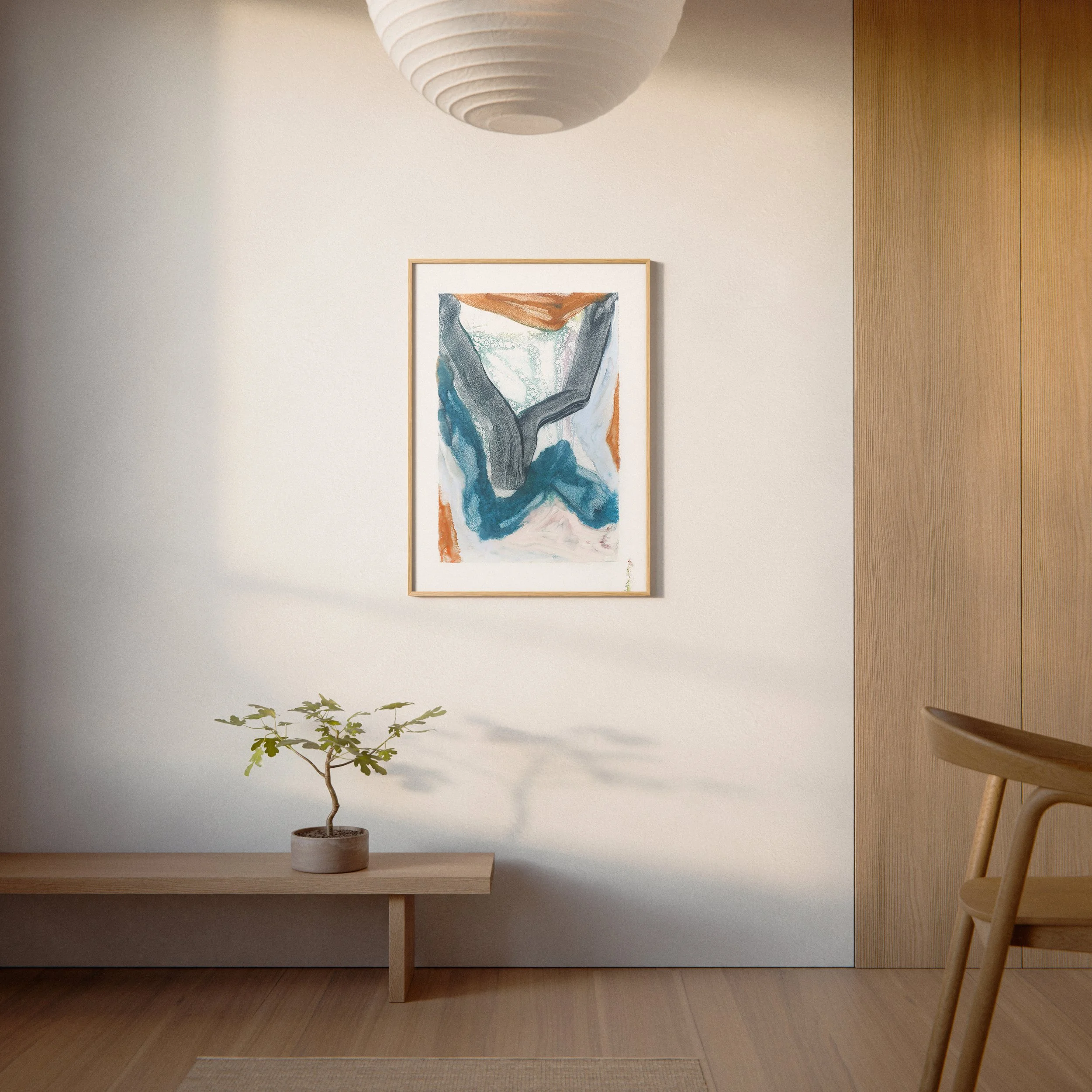 Tributary by Melissa McGill displayed in a natural wood frame above a low wood bench in a warm minimalist interior.