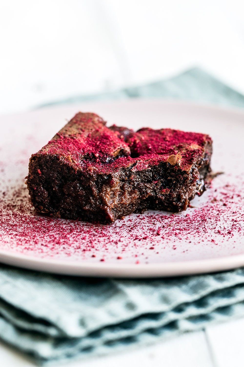 Chocolate brownie with raspberry dust